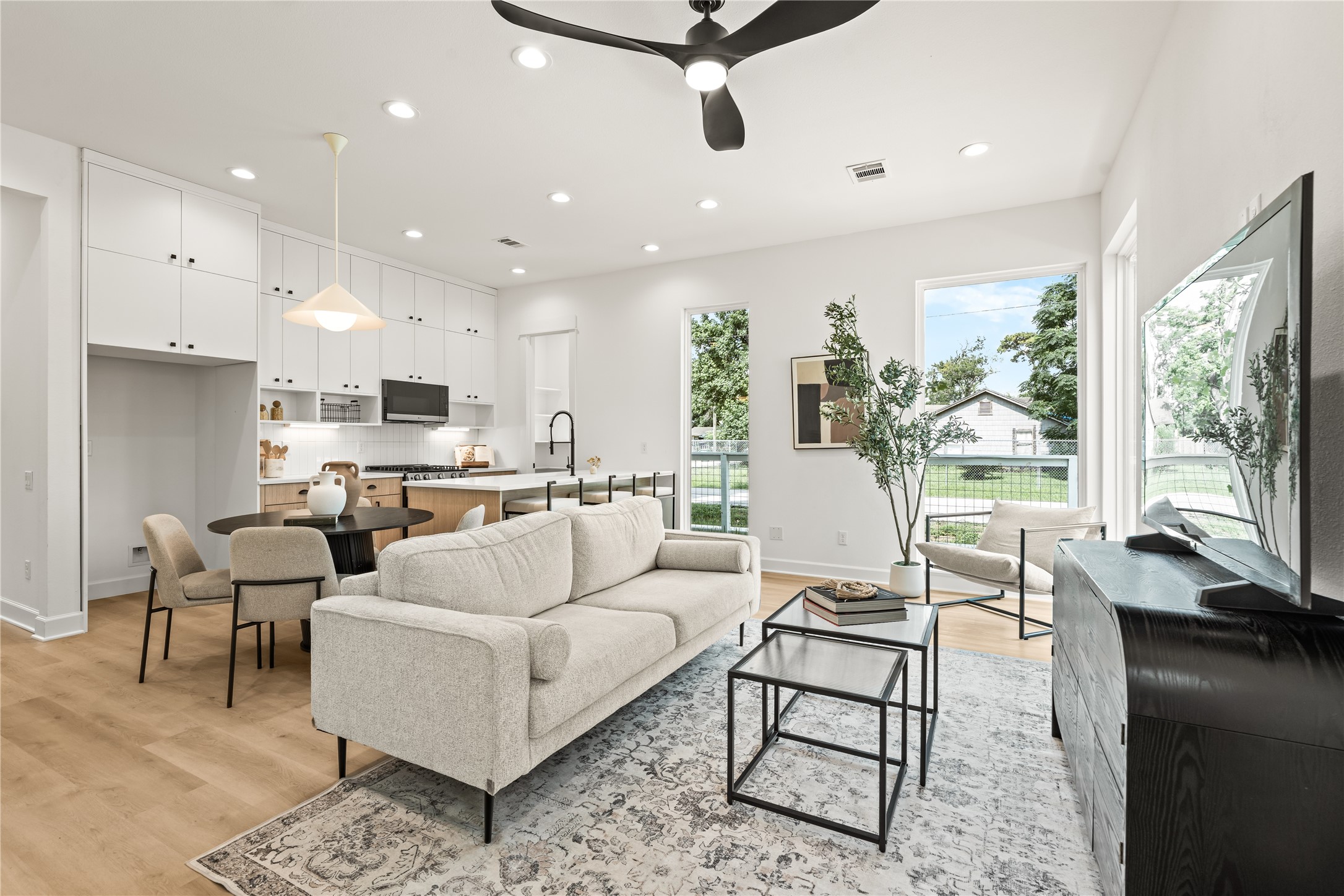 Open-concept main floor flooded with natural light  Drafthouse designed every detail