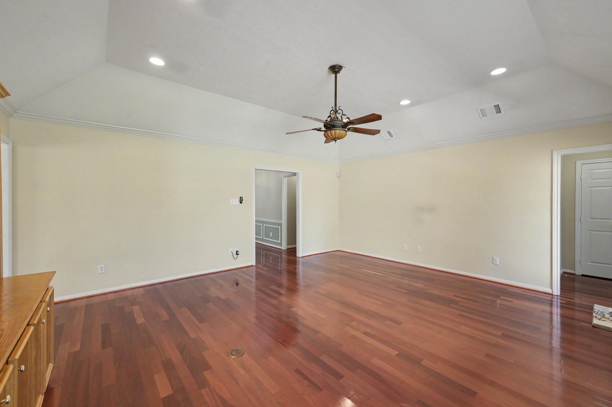 Another view of the spacious living area with plenty of room for all your furniture. The doorway leads to two spacious bedrooms and a full bathroom with separate shower & bathtub.