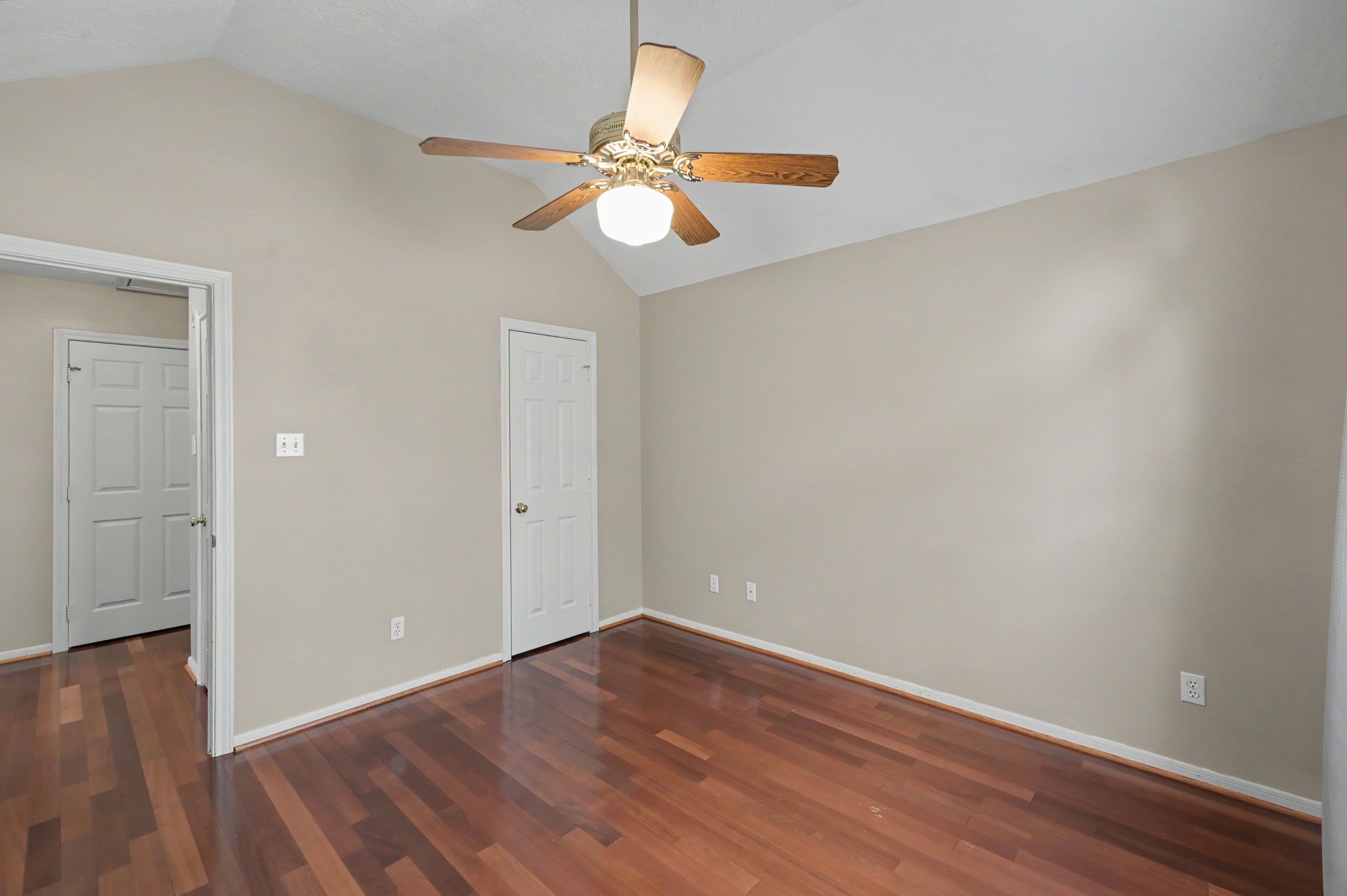 Another view of the second bedroom, offering a versatile space for many lifestyle needs.