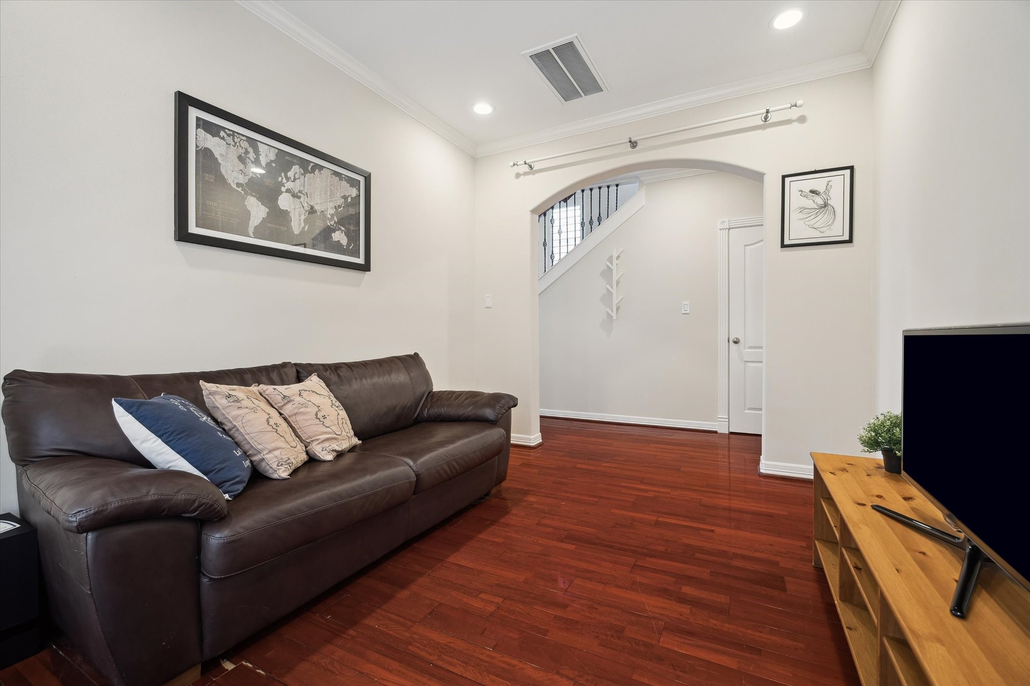 The first floor is complete with a bedroom, full bathroom, a walk in closet, and a sitting room, perfect for guests during the soccer world cup!