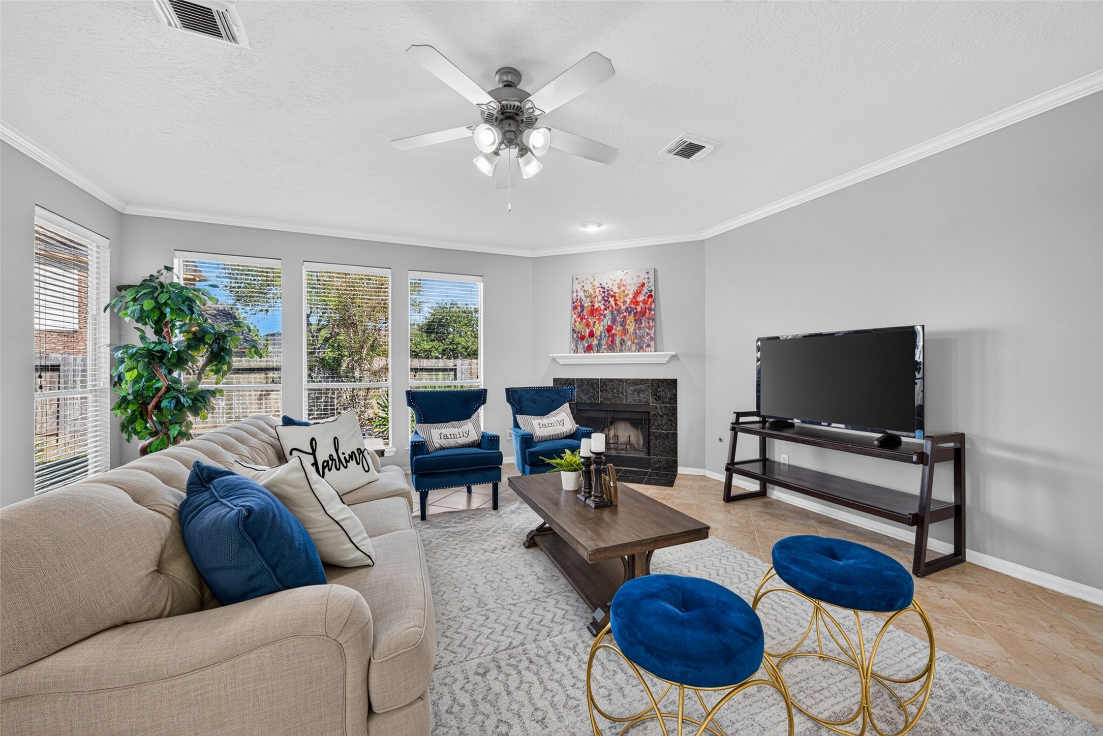 Warm up on cool evenings around the cozy fireplace, creating an inviting focal point for family movie nights or quiet relaxation.