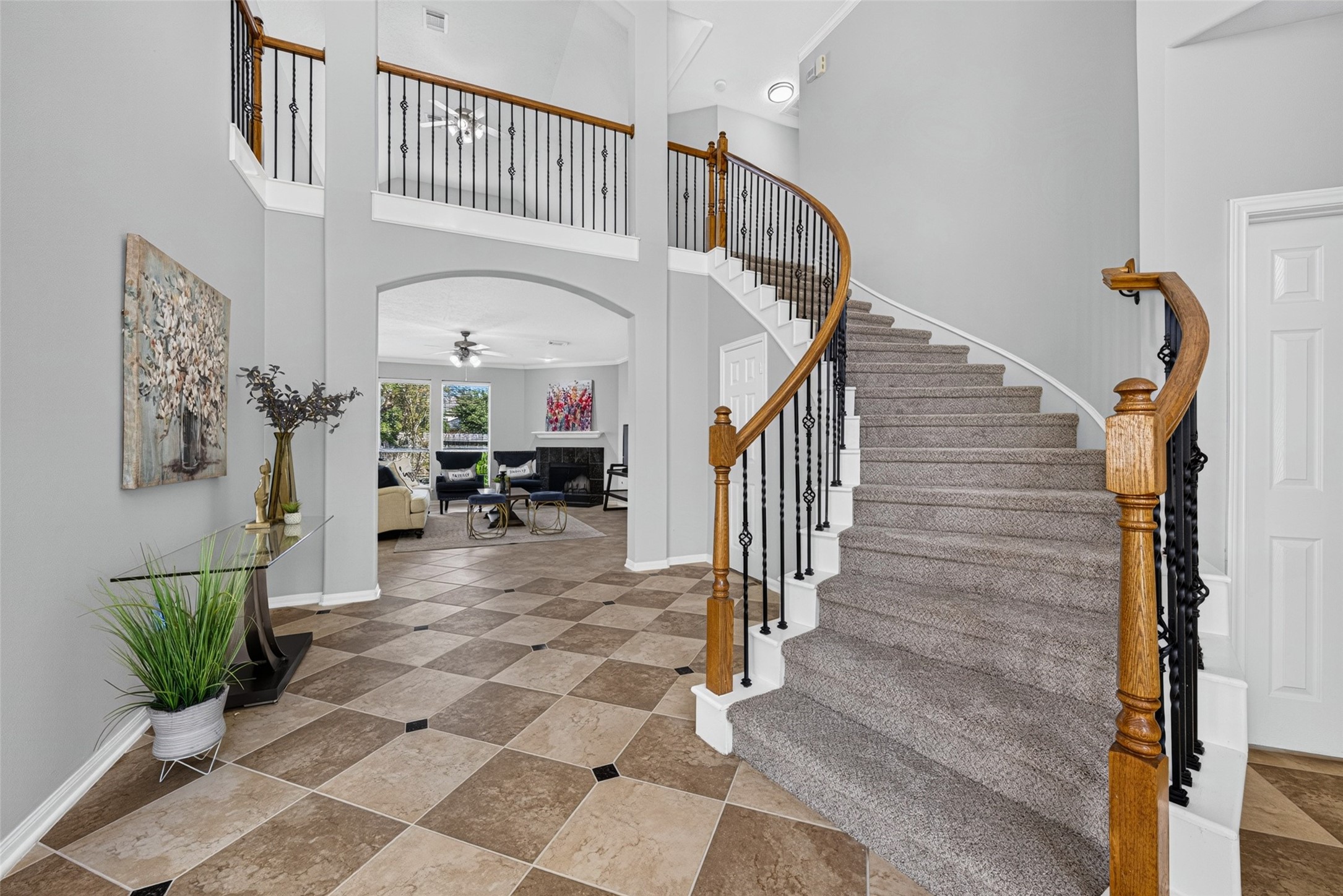 Step inside to a delightful entryway that immediately feels like home, highlighted by classic checkered tile flooring that adds a touch of timeless sophistication. Step inside to a delightful entryway that immediately feels like home, highlighted by classic checkered tile flooring that adds a touch of timeless sophistication.