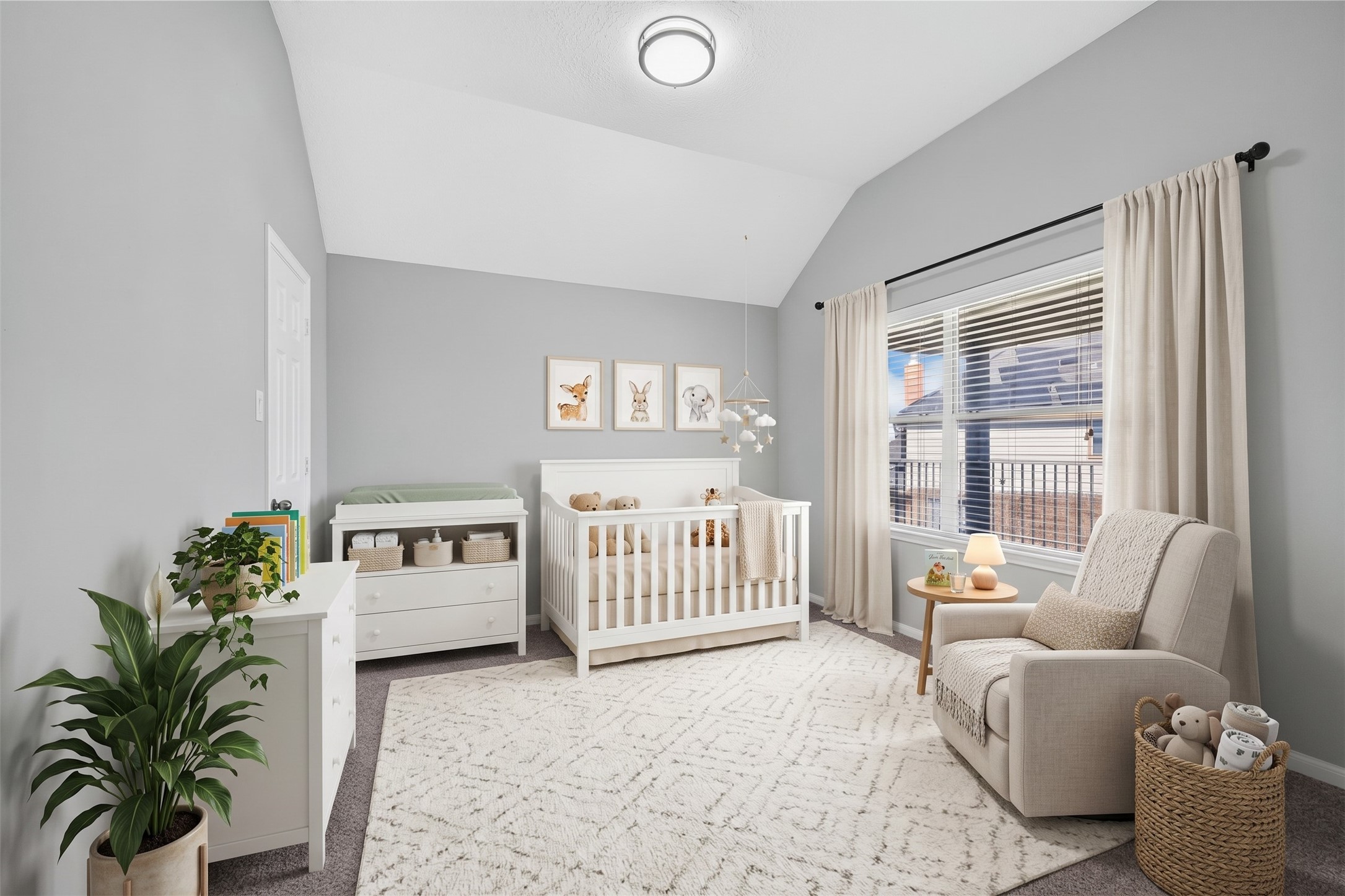 Warm and versatile, this cheerful third bedroom features cozy carpet flooring and a wide shuttered window, making it a peaceful space for rest, study, or a nursery room.