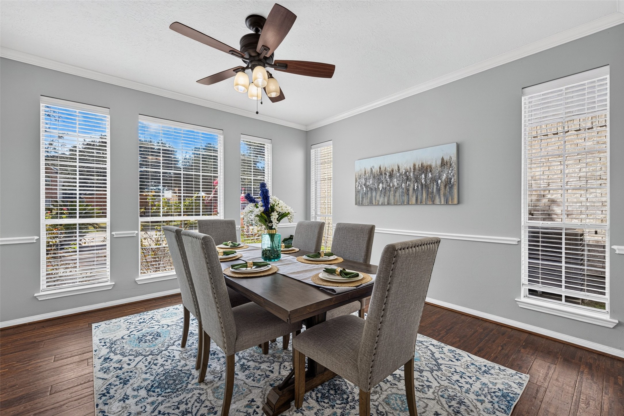 Natural light pours through wide shuttered windows, casting a warm ambiance over holiday feasts and casual dinner parties alike. Natural light pours through wide shuttered windows, casting a warm ambiance over holiday feasts and casual dinner parties alike.