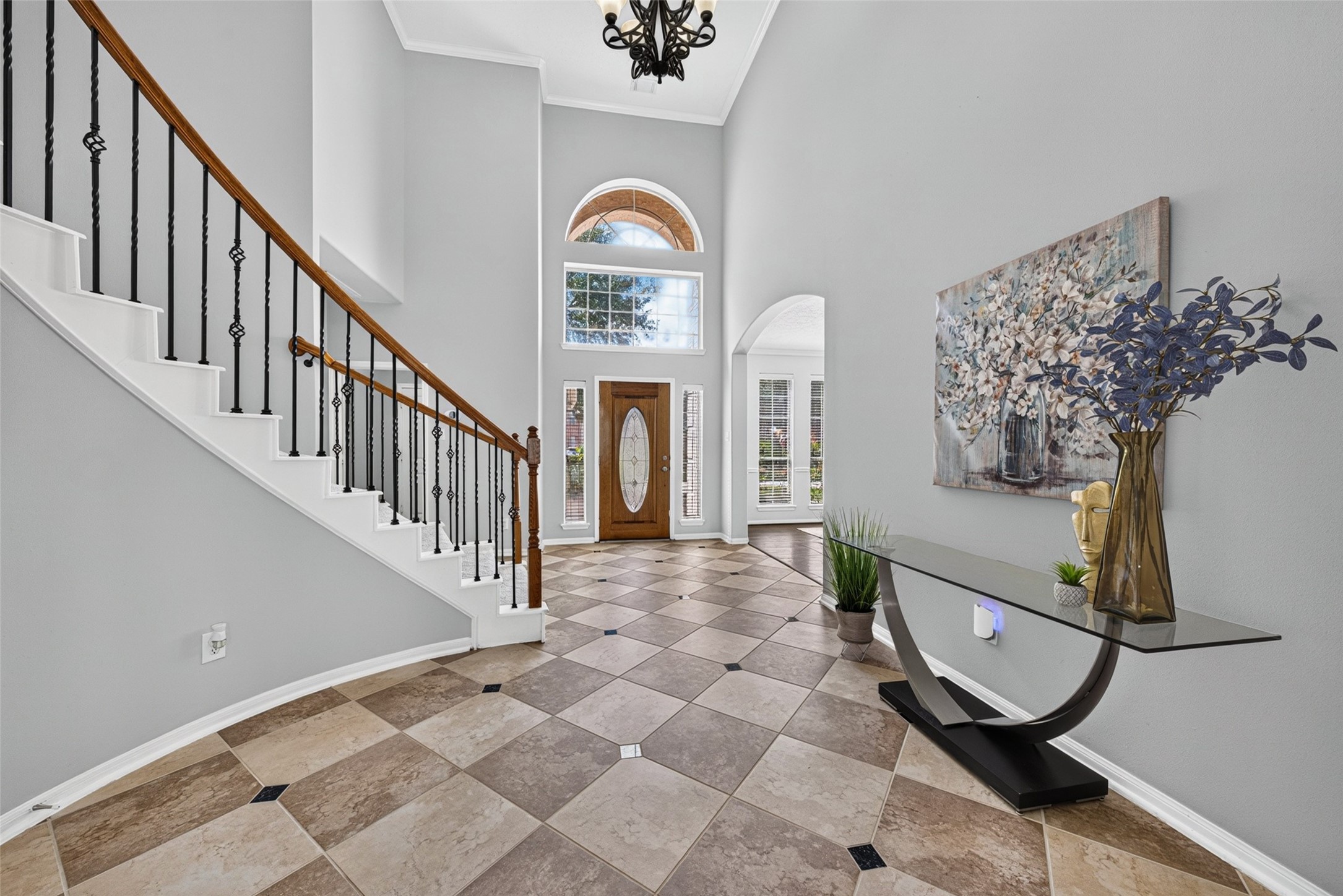 This welcoming foyer sets a comforting tone for the entire house, inviting you to kick off your shoes and relax. This welcoming foyer sets a comforting tone for the entire house, inviting you to kick off your shoes and relax.