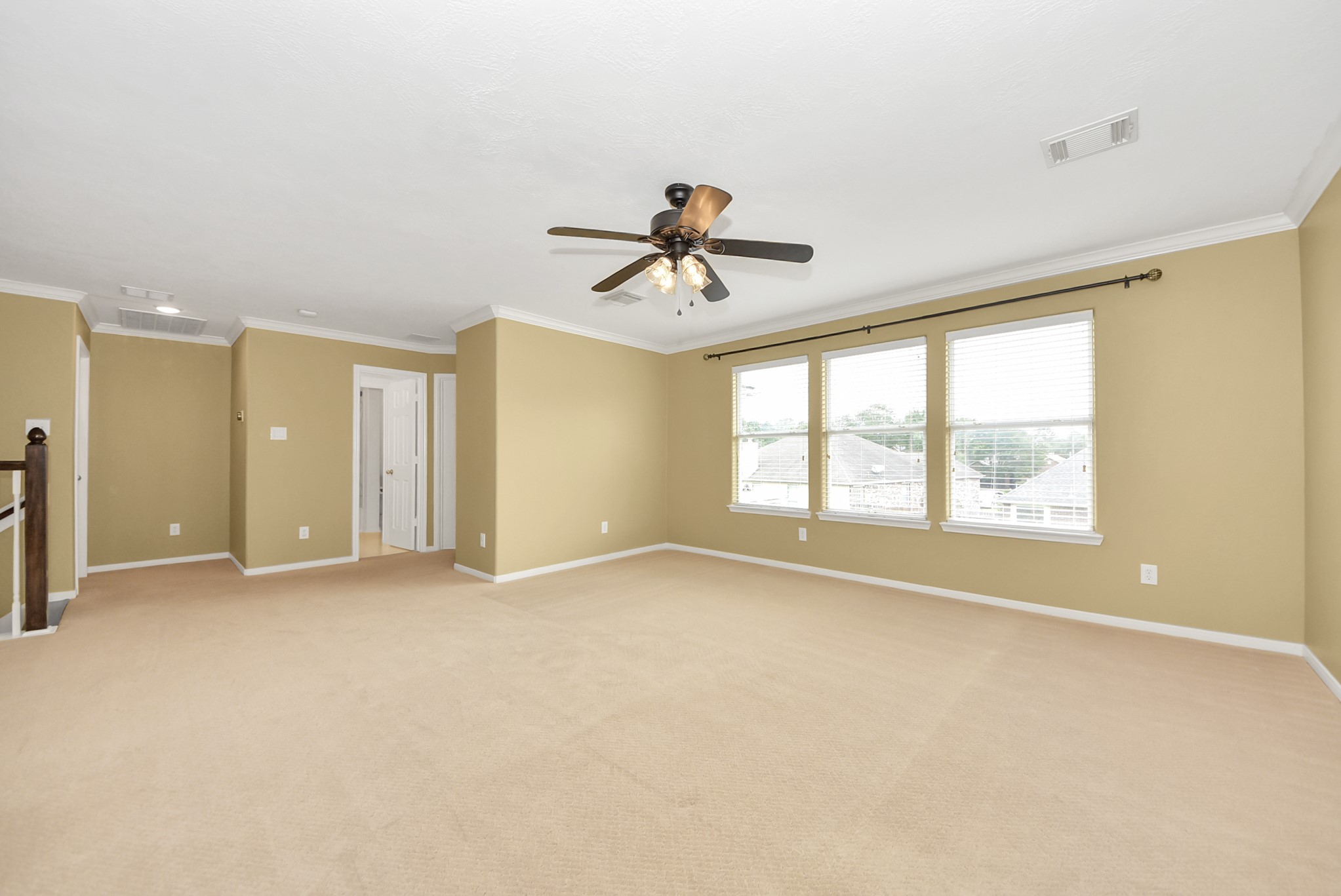 With its generous size, this upstairs gameroom creates endless possibilities for entertainment, a media space, play area, home gym, or the ultimate hangout spot.