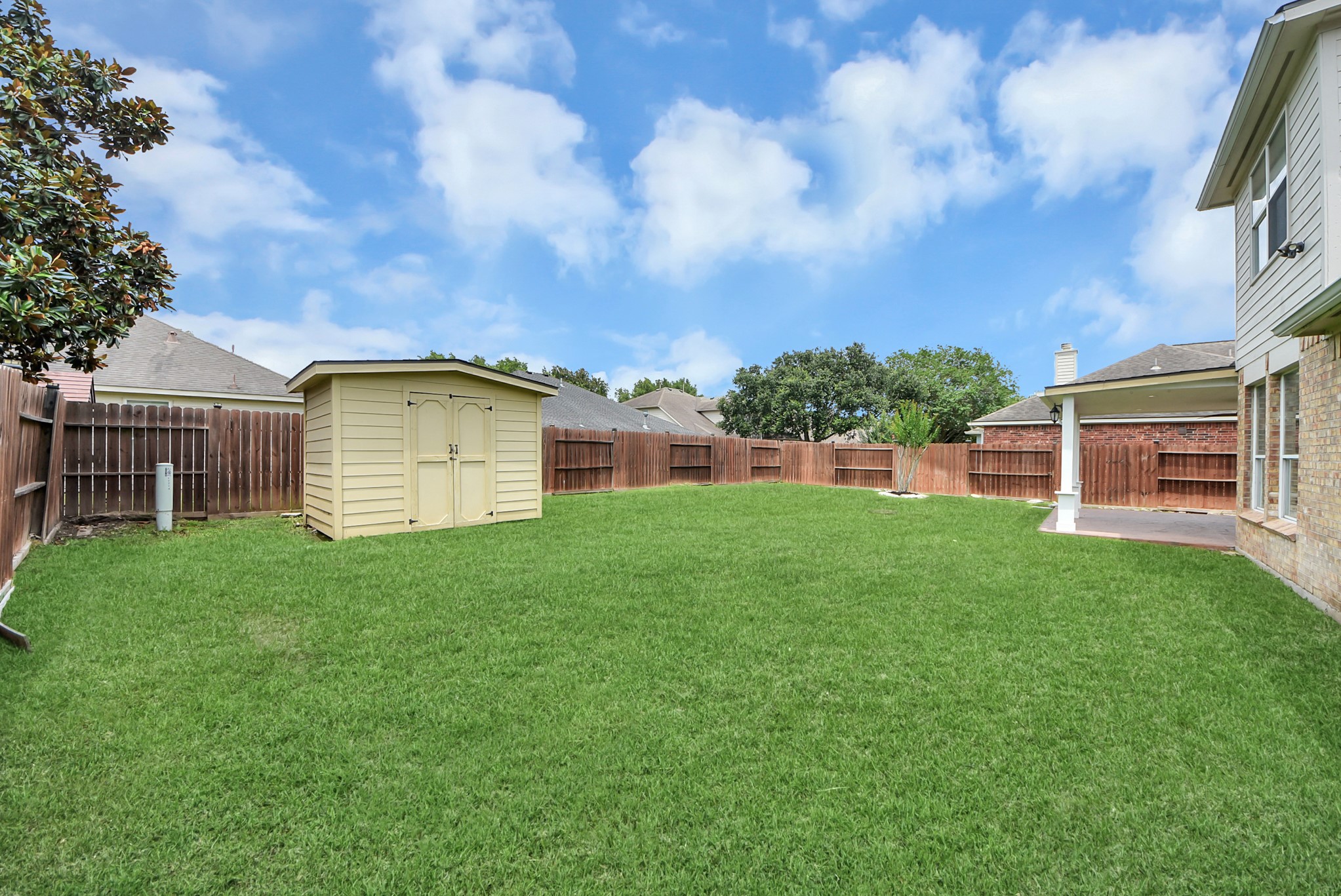 Extra storage is always a welcome bonus! Tucked into the backyard, the storage shed provides convenient space for lawn equipment, gardening tools, seasonal dcor, and more.