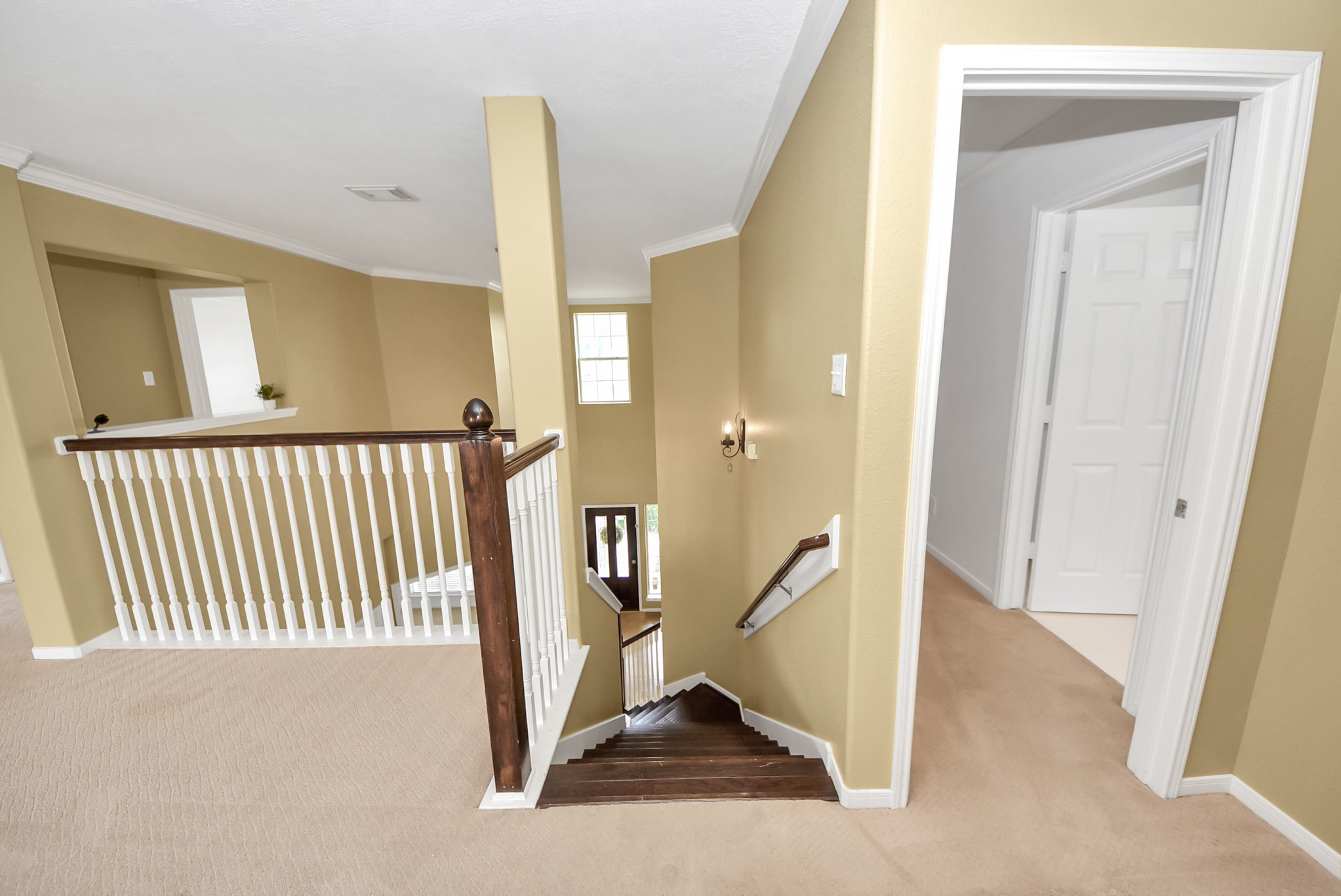 Head upstairs to discover a spacious second level featuring a huge gameroom and three additional bedrooms, each with access to a full bath for added comfort and convenience.