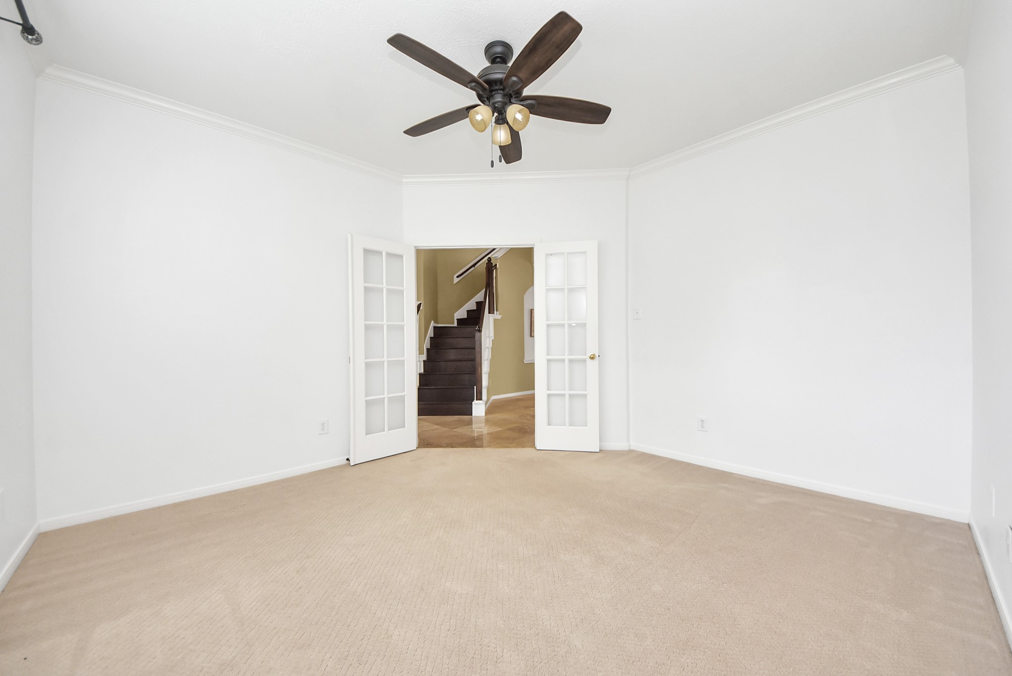Flexibility meets functionality through the French doors in this versatile ground-floor space. Perfect as a home office, study, playroom, hobby room, or quiet retreat, it can easily adapt to your changing needs over time.
