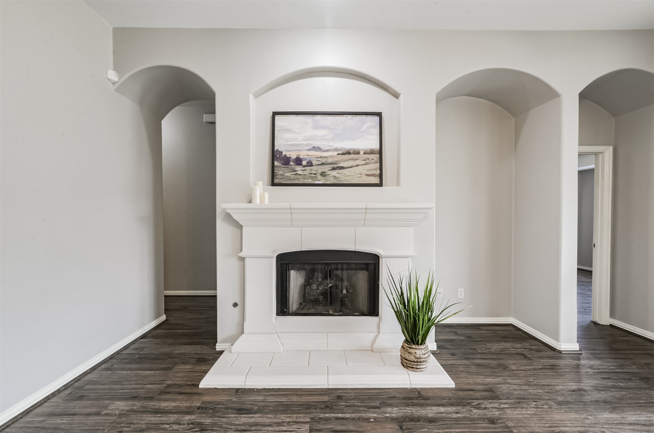 Cast stone gas log fireplace.