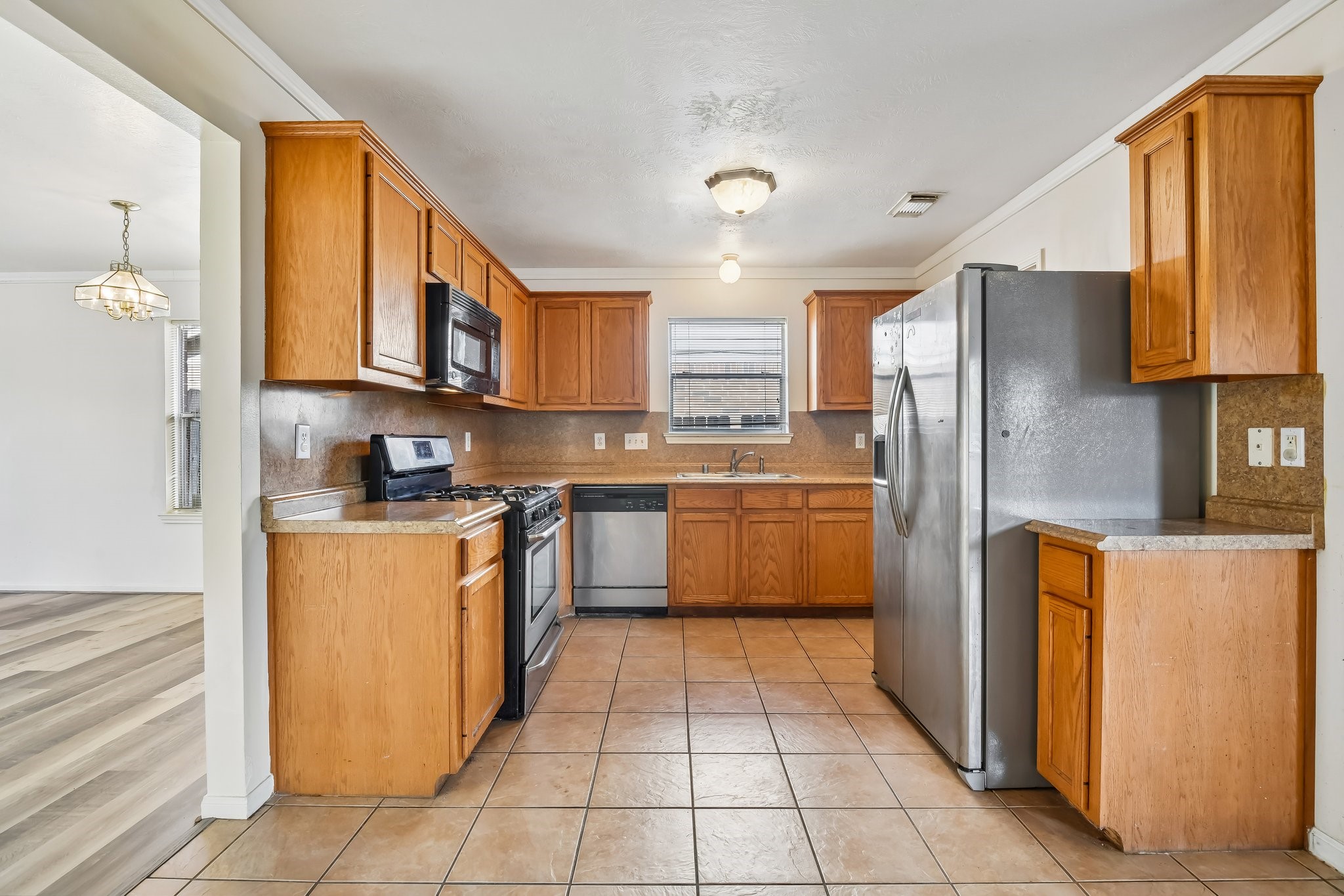 Kitchen with dining room to the left. Kitchen with dining room to the left.