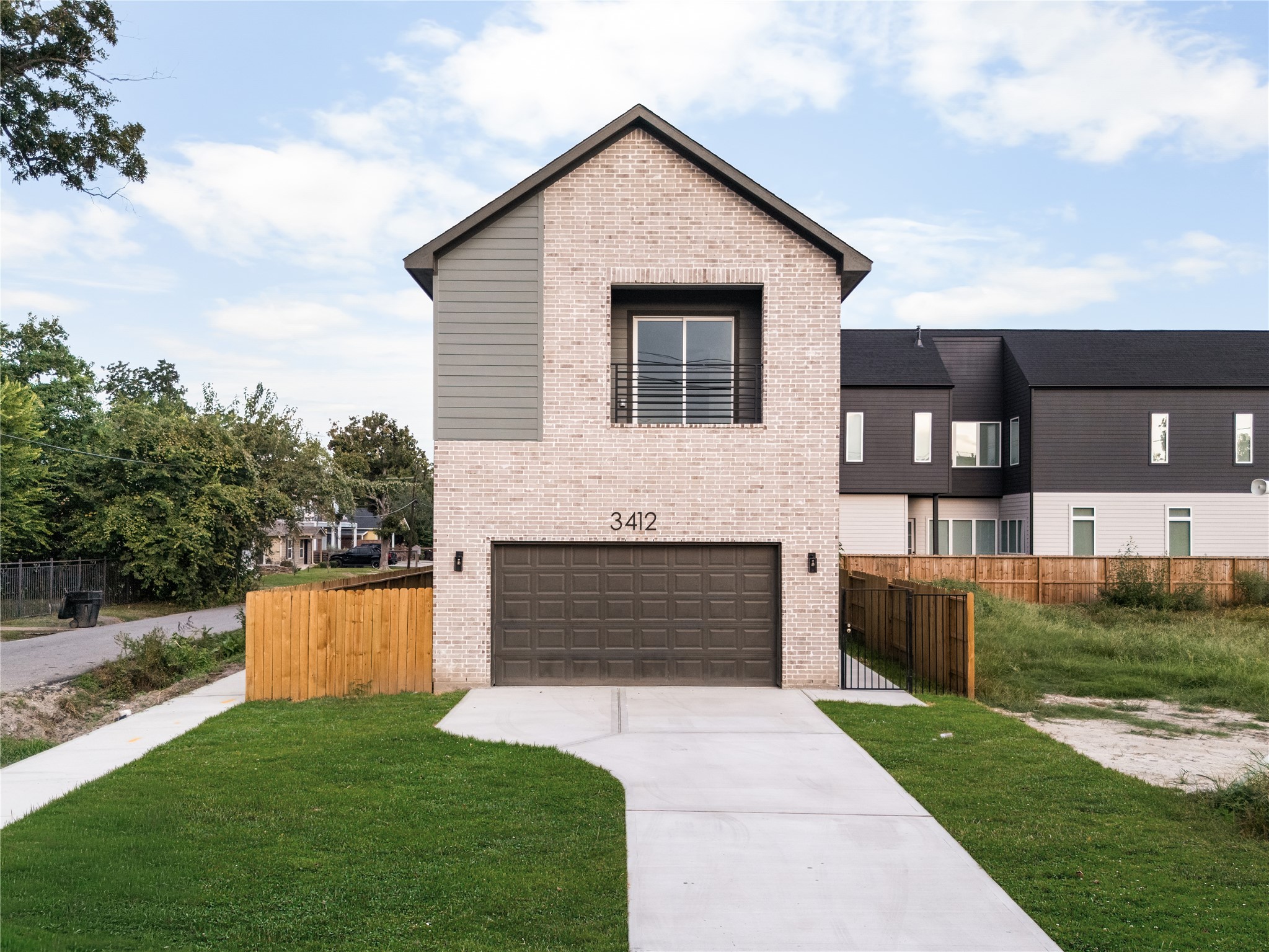 Welcome to 3412 Cortlandt Street, where a light-toned brick
faade, muted gray-green lap siding, and a recessed private
balcony come together in a crisp, contemporary composition that
makes a confident first impression. Welcome to 3412 Cortlandt Street, where a light-toned brick
faade, muted gray-green lap siding, and a recessed private
balcony come together in a crisp, contemporary composition that
makes a confident first impression.