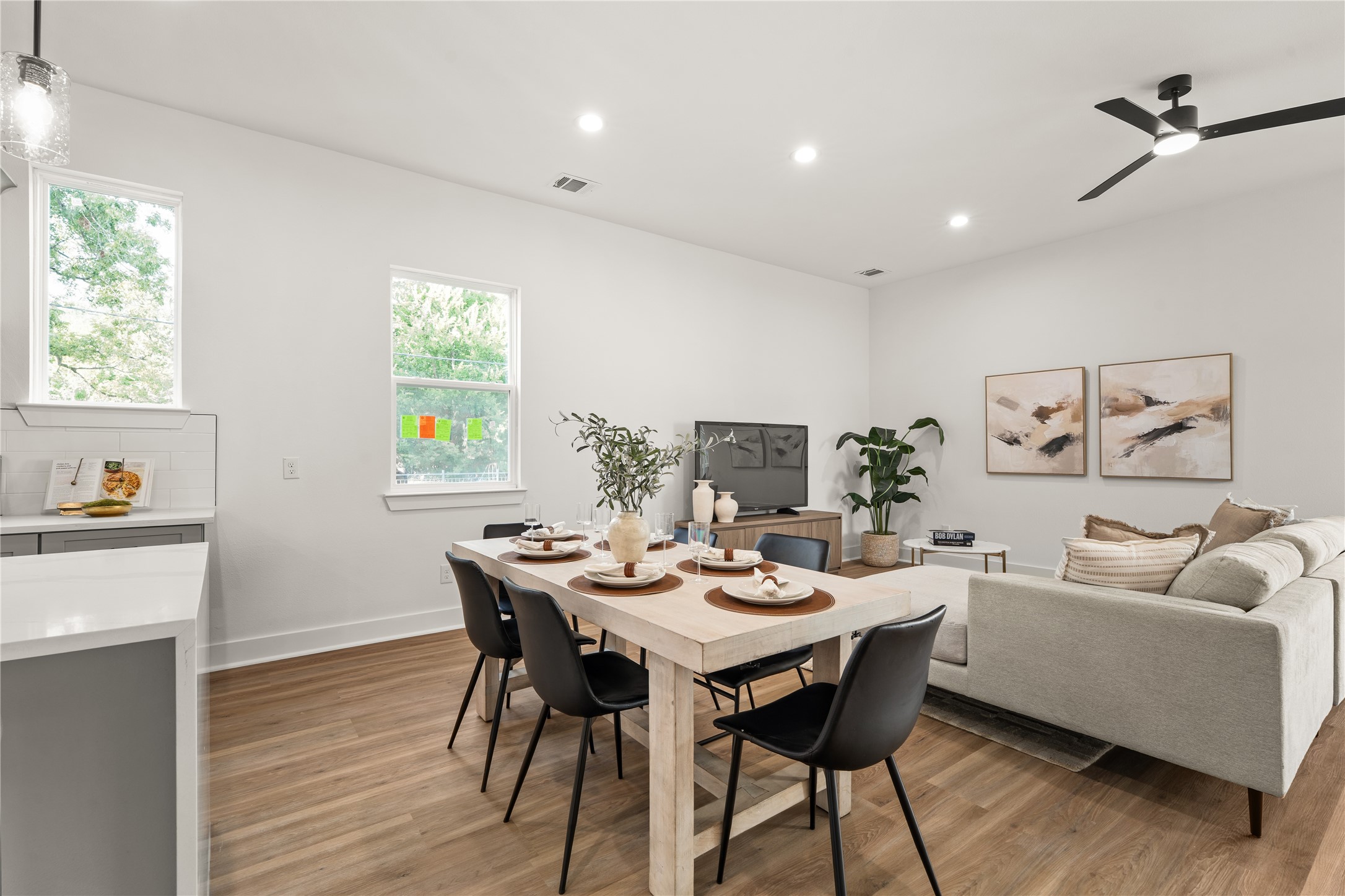 Natural light pours in through multiple windows, giving the dining space an airy, relaxed feel that suits
both weeknight dinners and effortless entertaining.