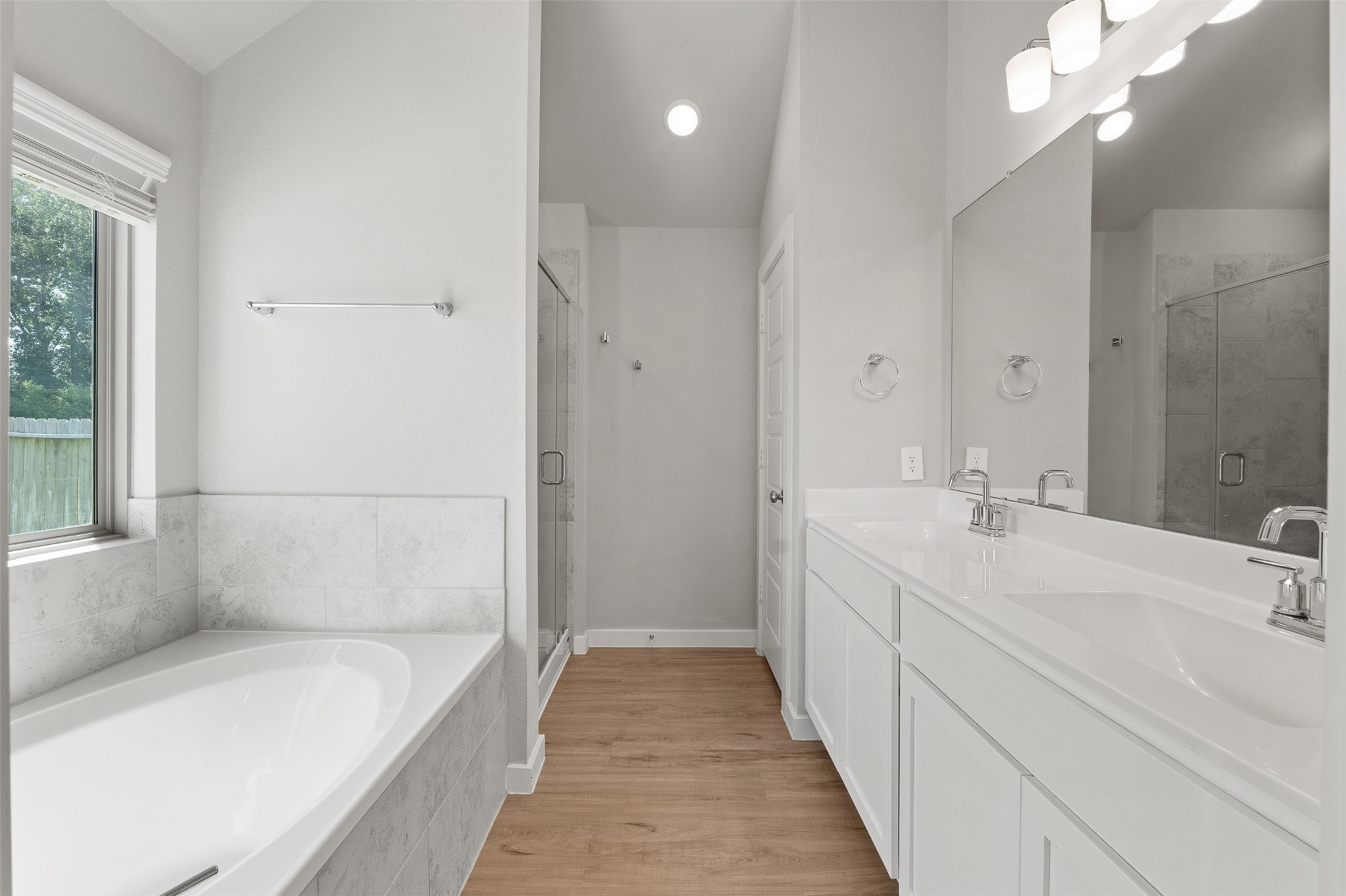 Primary bath with separate tub and shower