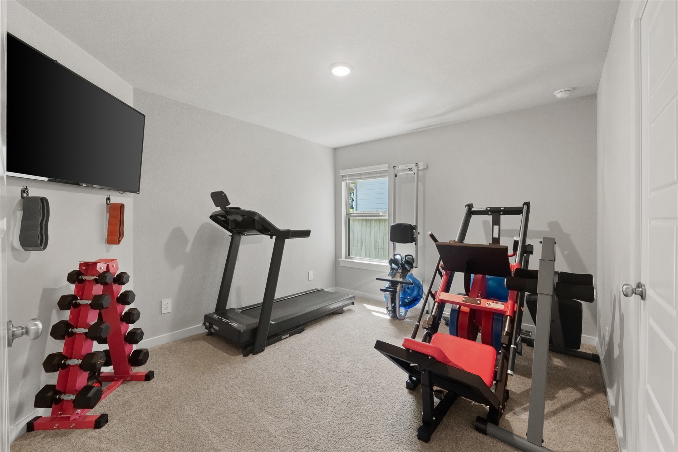 Guest bedroom #3 is currently used as a work out room
