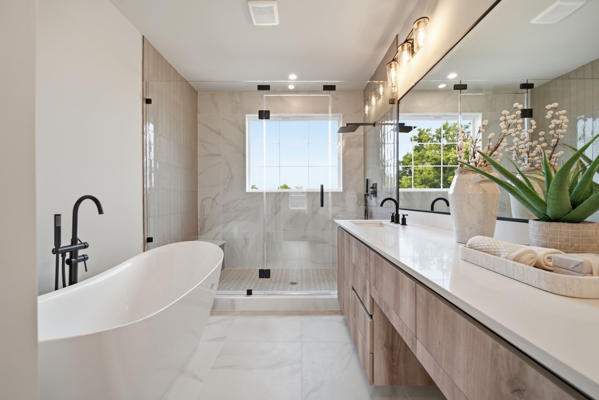 Primary bathroom suite with a luxurious feel and thoughtful design.