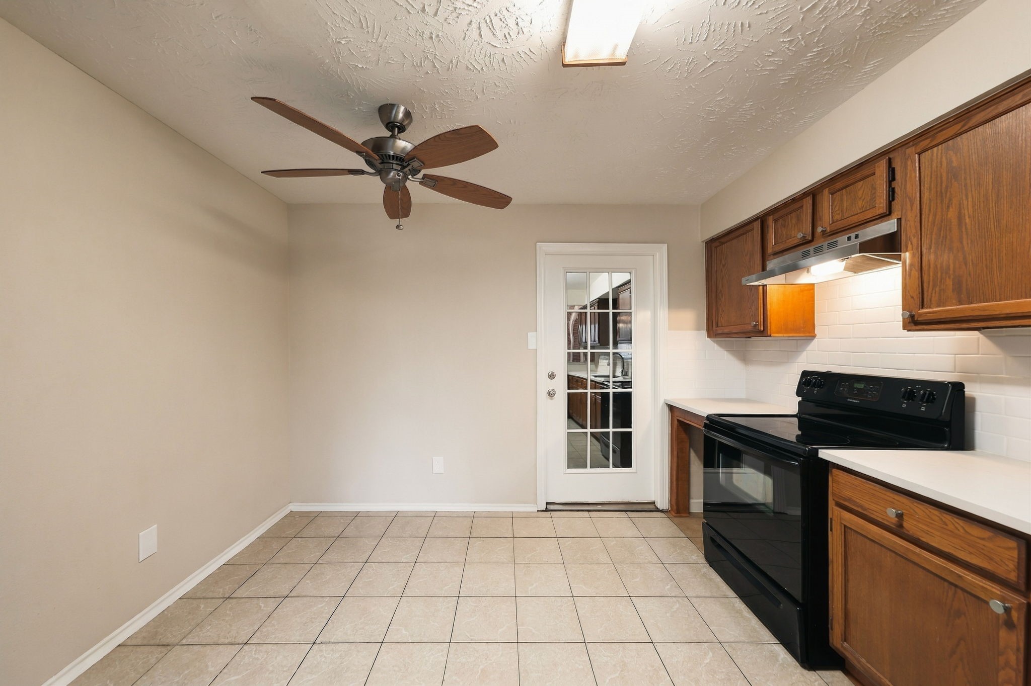 This space is perfect for additional cabinetry/counterspace or a breakfast nook.