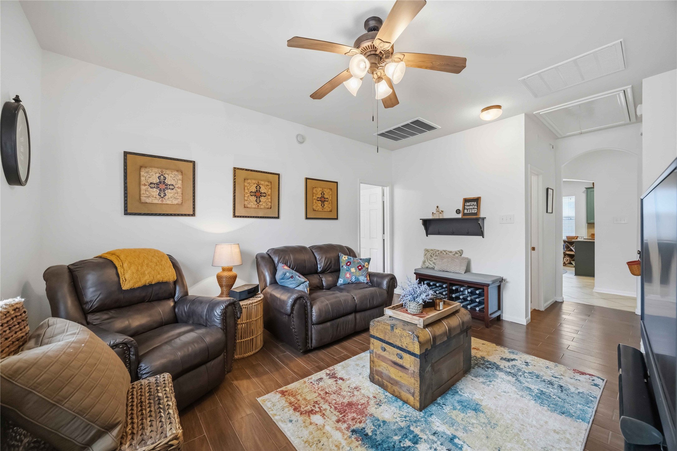 Another angle of the flexible den highlighting its generous wall space and convenient connection to the main hallway.