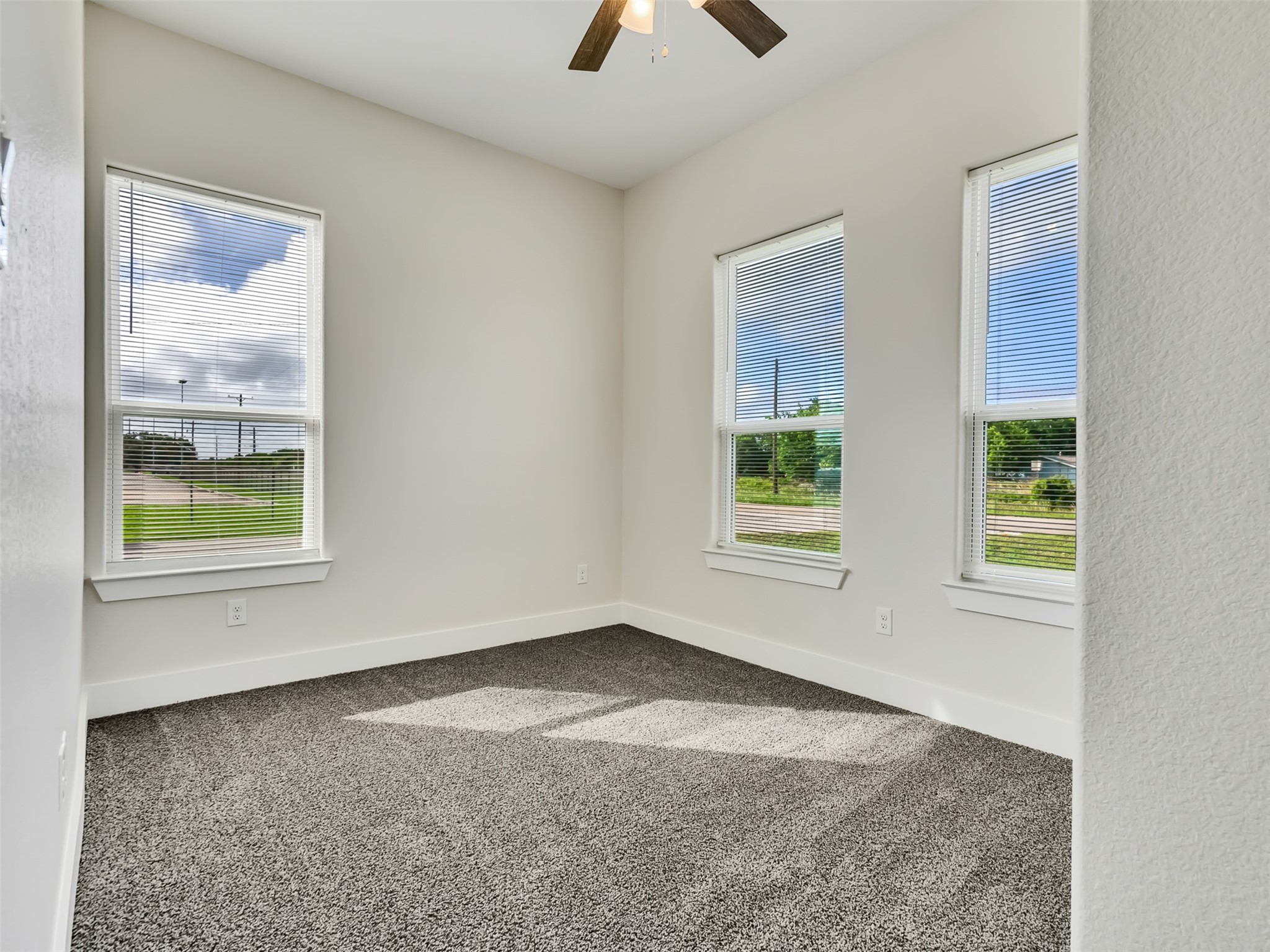 Lots of natural  light in this bedroom.