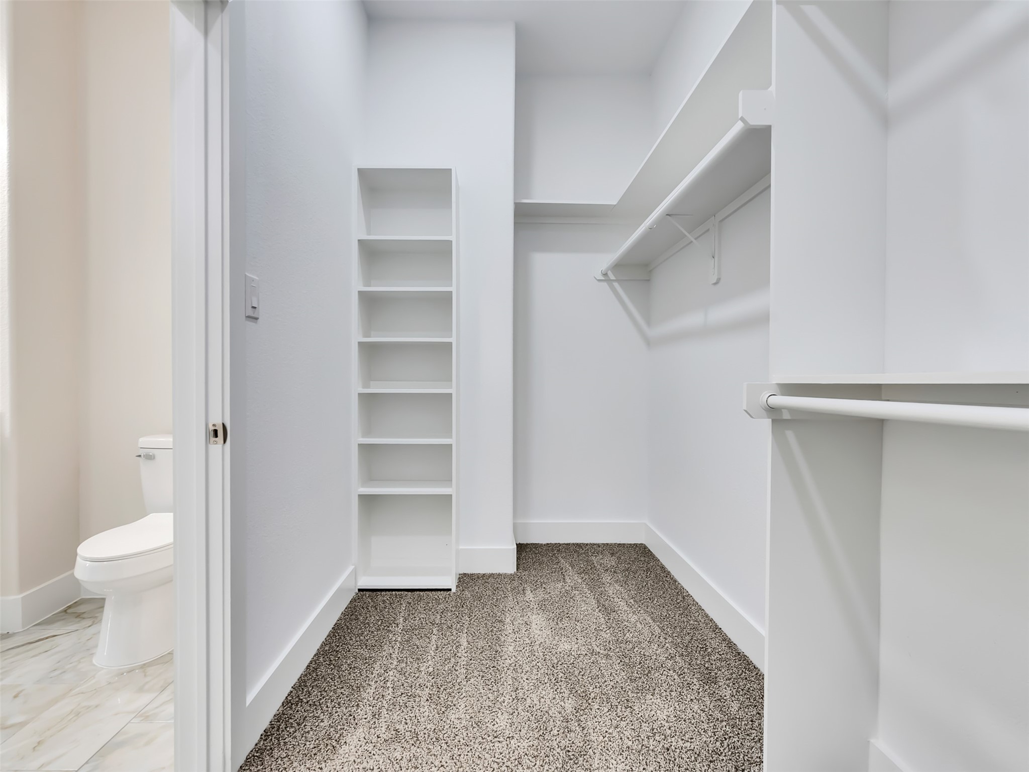 Built-ins in the primary closet.