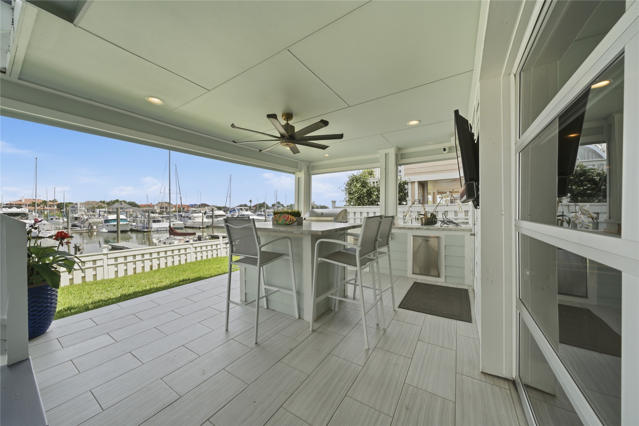 The outdoor kitchen off of the garage, allows for extra entertaining space.