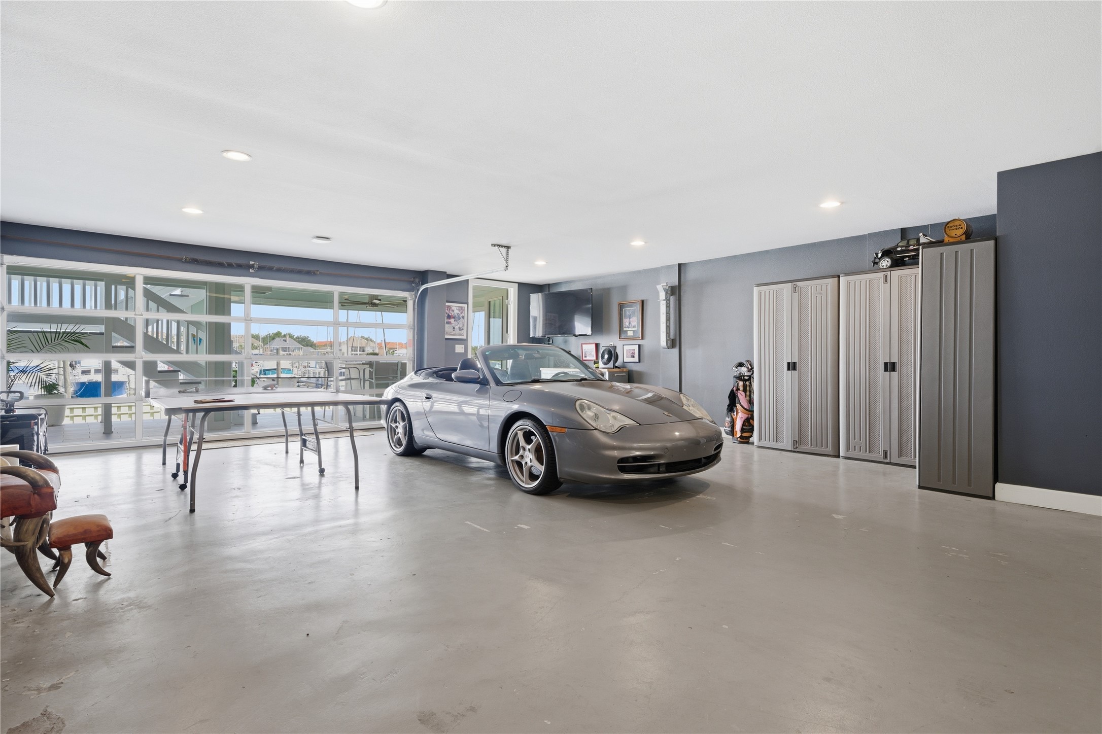 View of the back of the garage with the glass door.