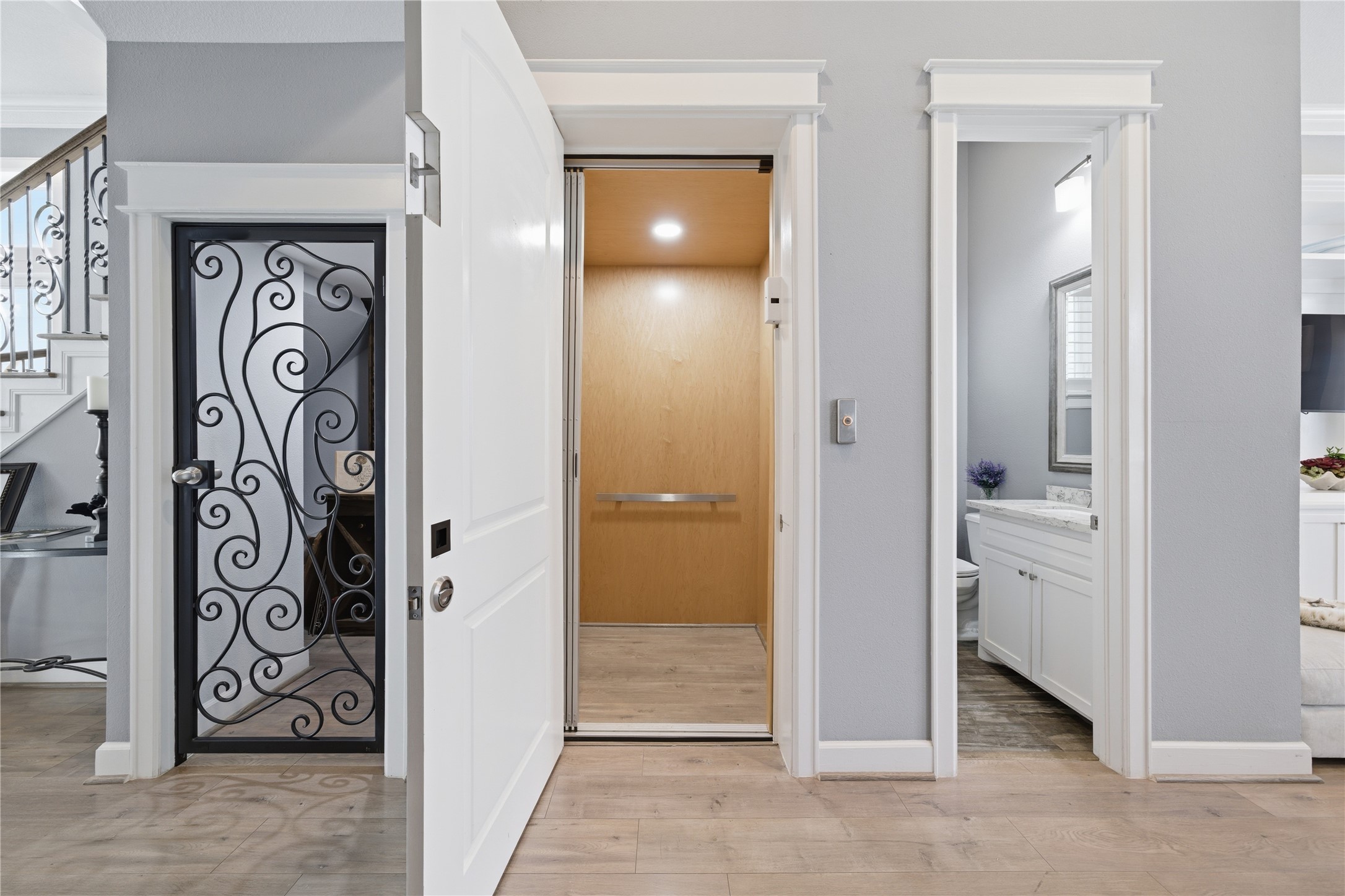 Wine room, elevator, and half bath.