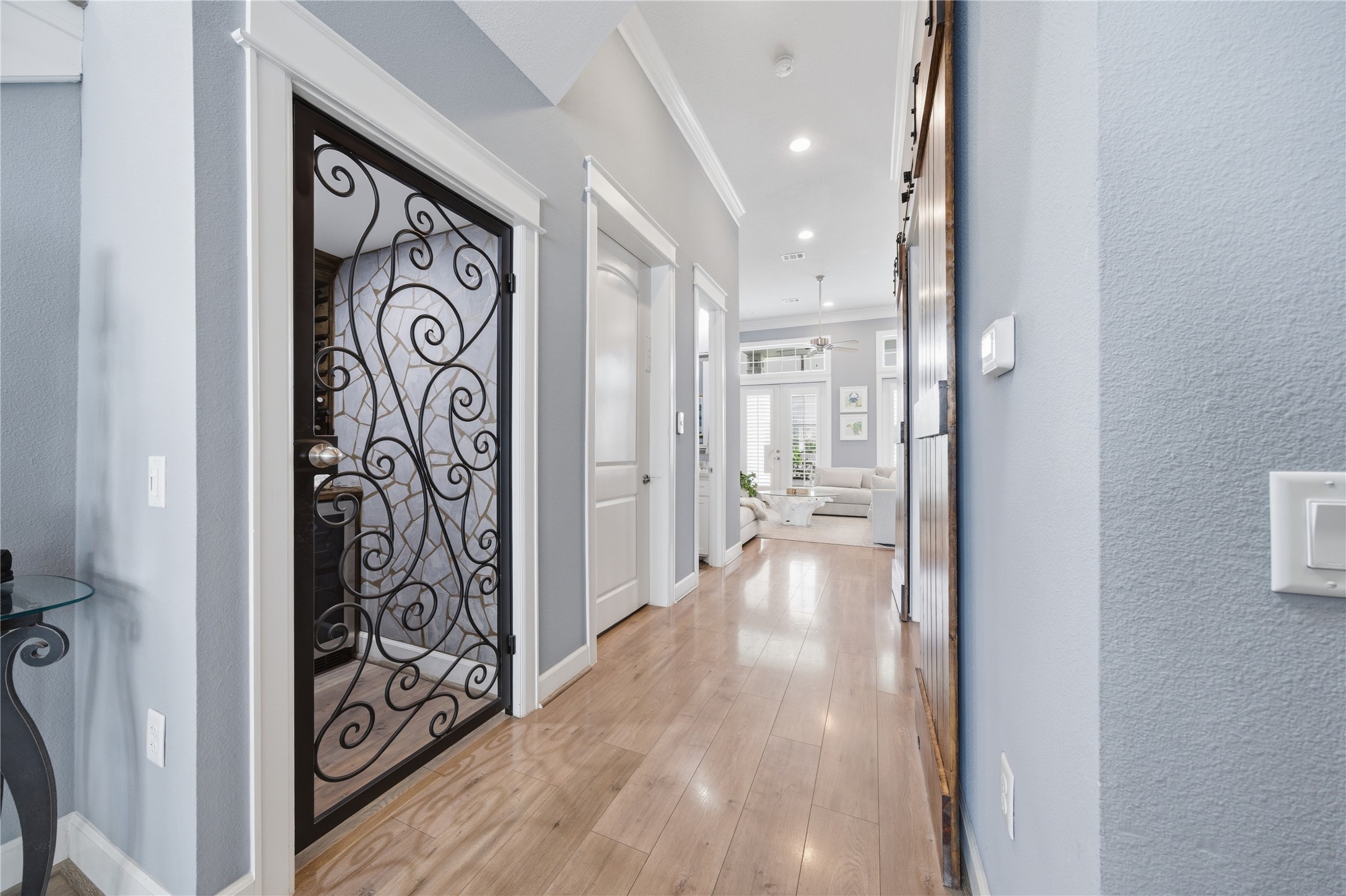 On the 2nd level, you will find the entertaining spaces, complete with wine room and the elevator to the right of it.