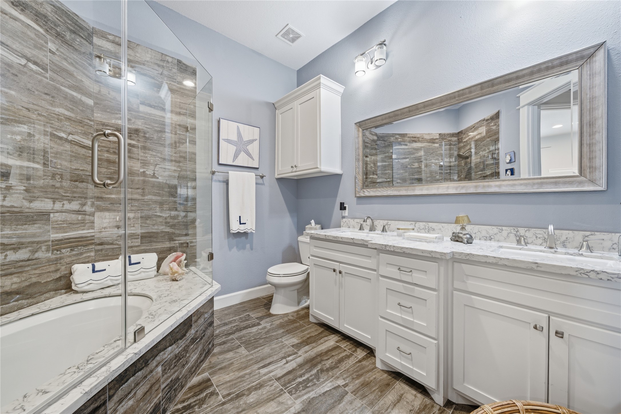 Guest bathroom had a large soaking tub and shower combo.