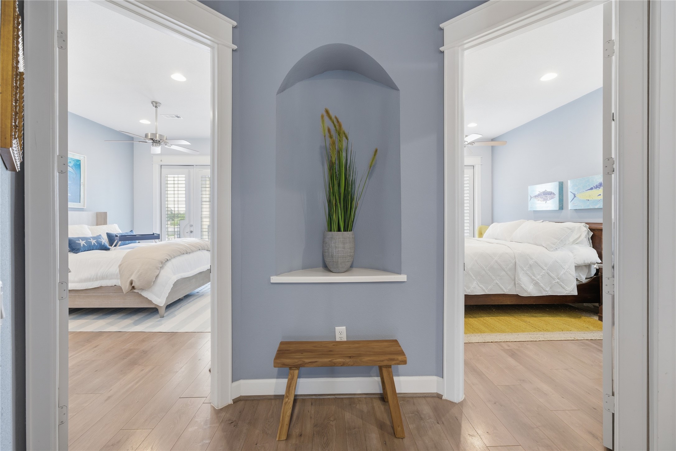 Opposite the primary bedroom, you'll find the secondary bedrooms at the front of the house.
