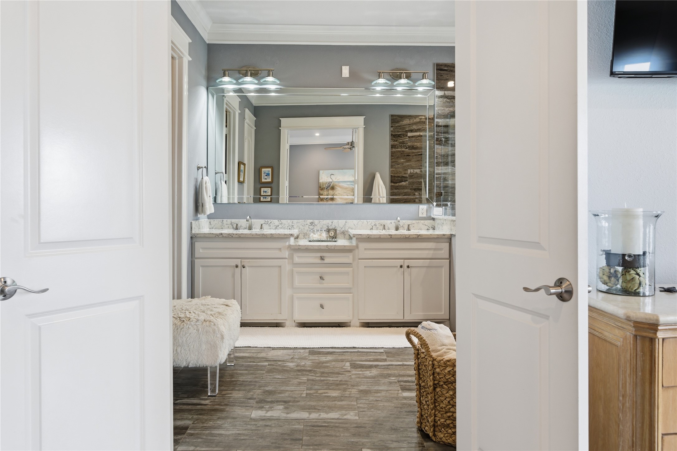 The spacious primary bedroom has a dual vanity.