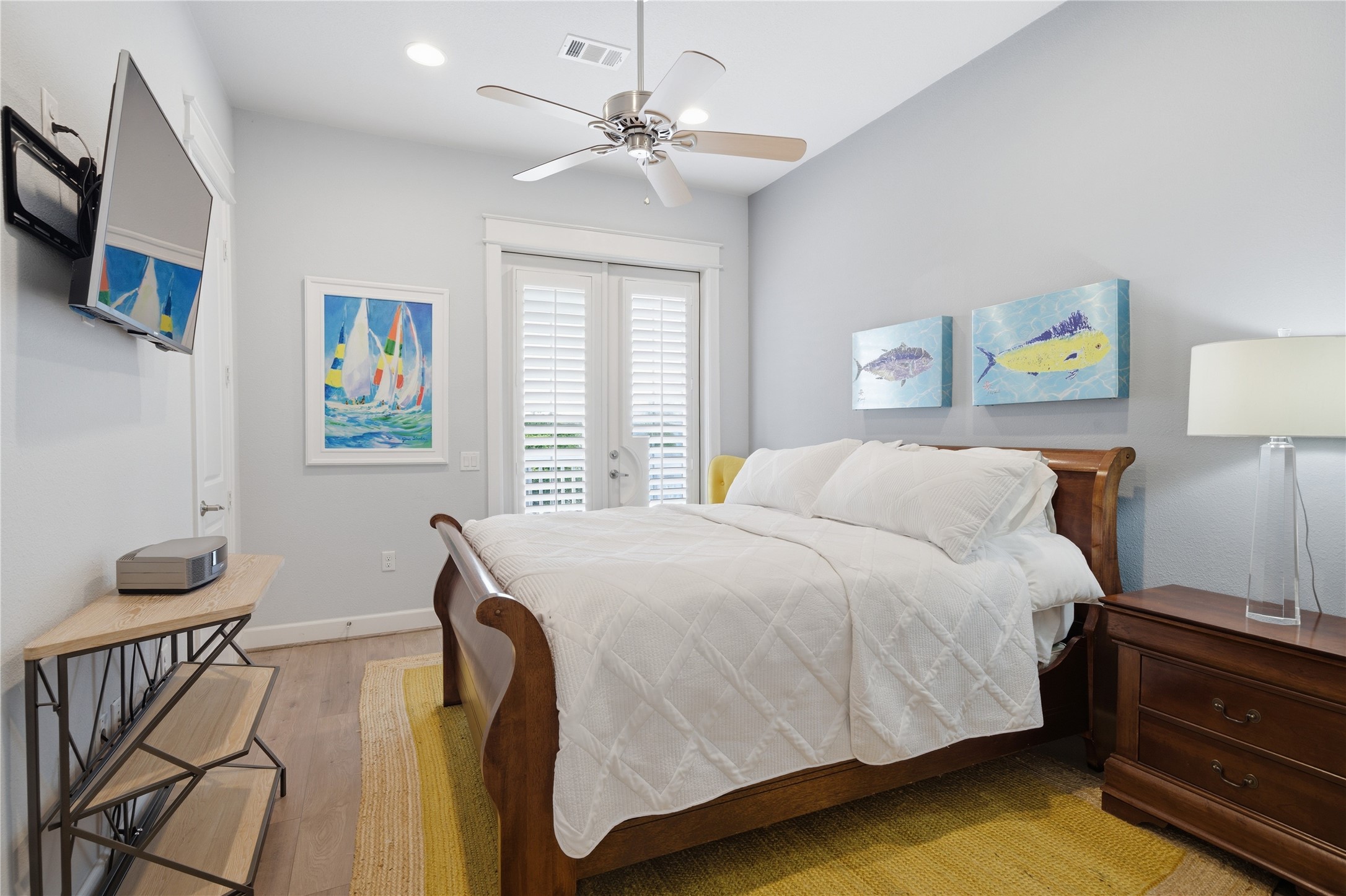 Bedroom #3 with french doors to the front balcony.