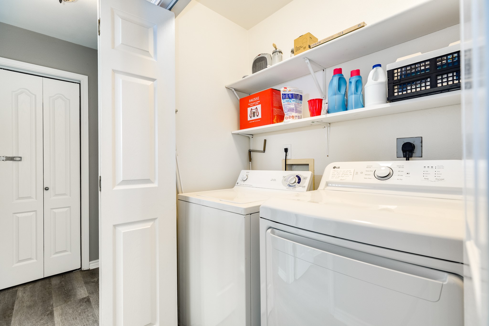 Utility closet located in the main hallway.