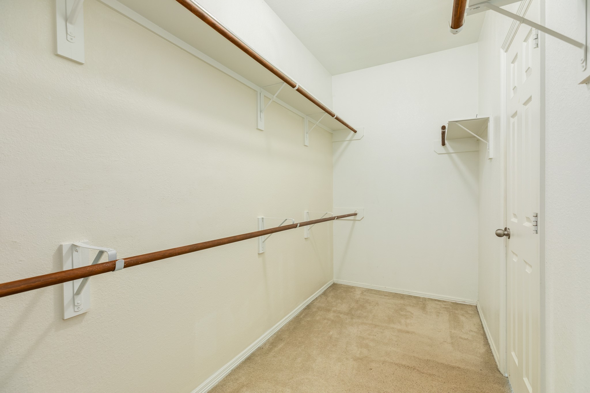 Oversized walk in closet in primary.