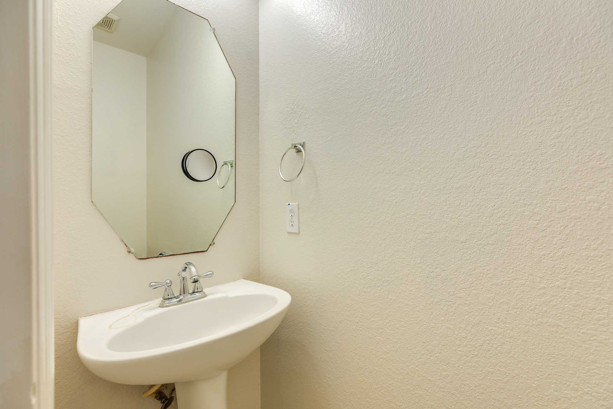 Half bath located downstairs for guests