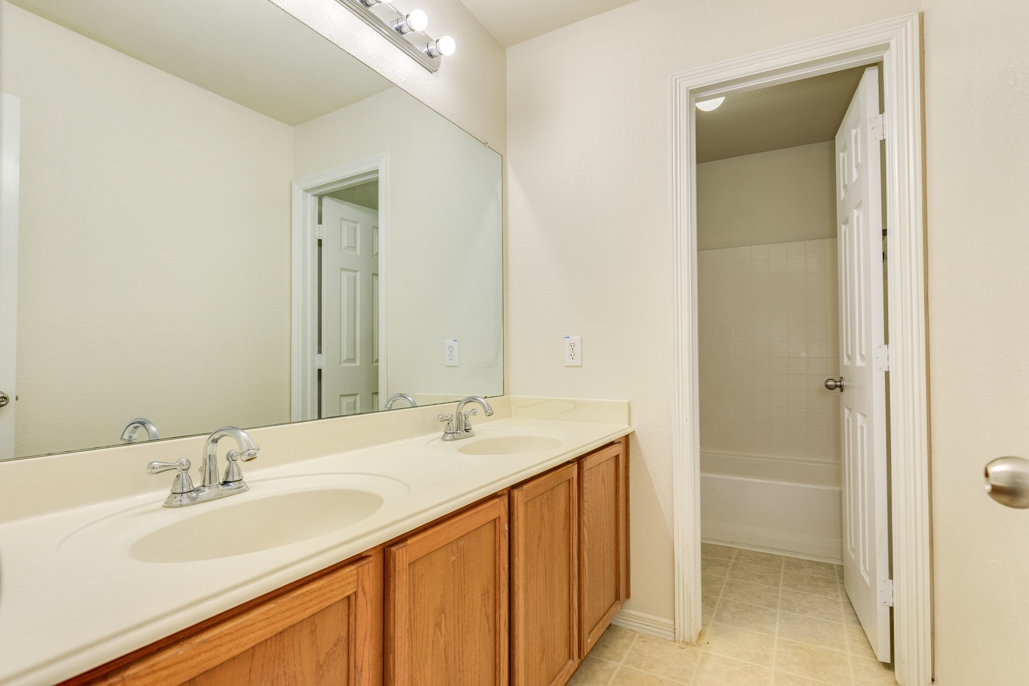 Dual sinks and spacious bathroom for the upstairs bedrooms.