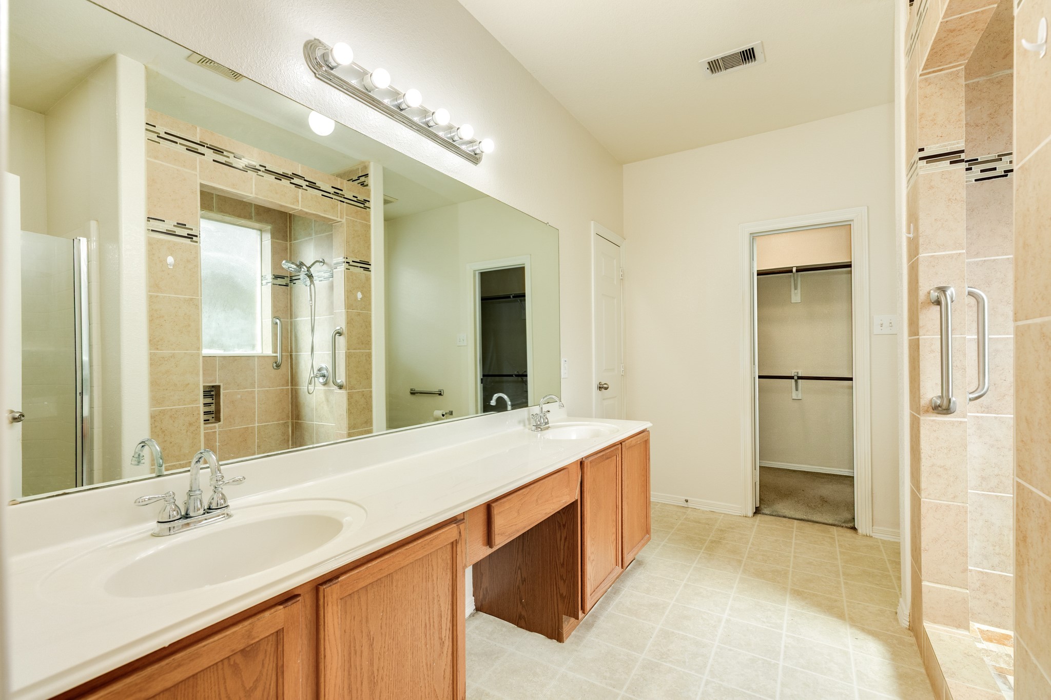 Dual vanities in the primary bathroom.