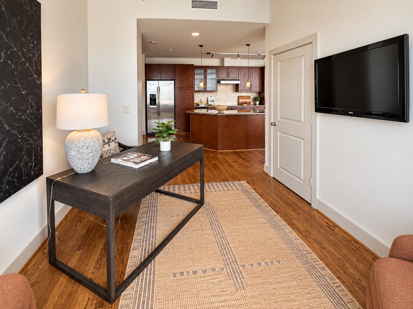 A thoughtful open layout allows each space to feel connected while still maintaining its own purpose. Whether working from home, entertaining friends, or simply enjoying a quiet afternoon, the residence is designed around an effortless lock-and-leave lifestyle.