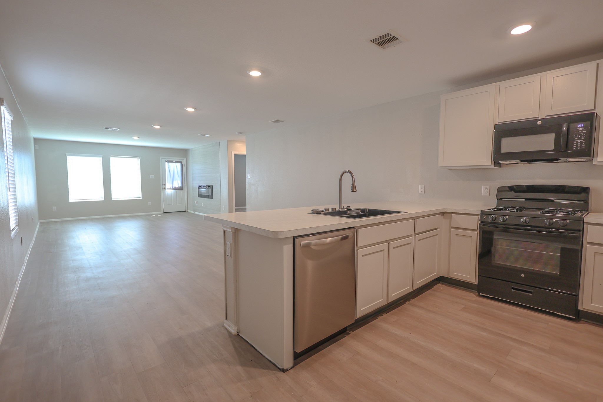 Kitchen is open to Dining & Living Room
