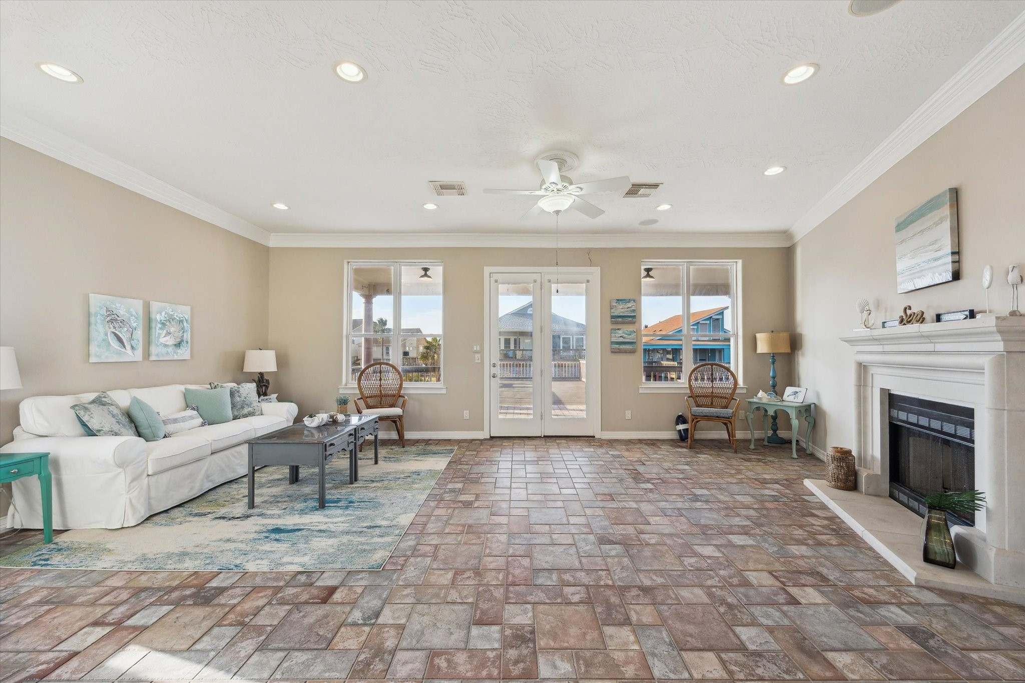 Large family room includes a showcase fireplace