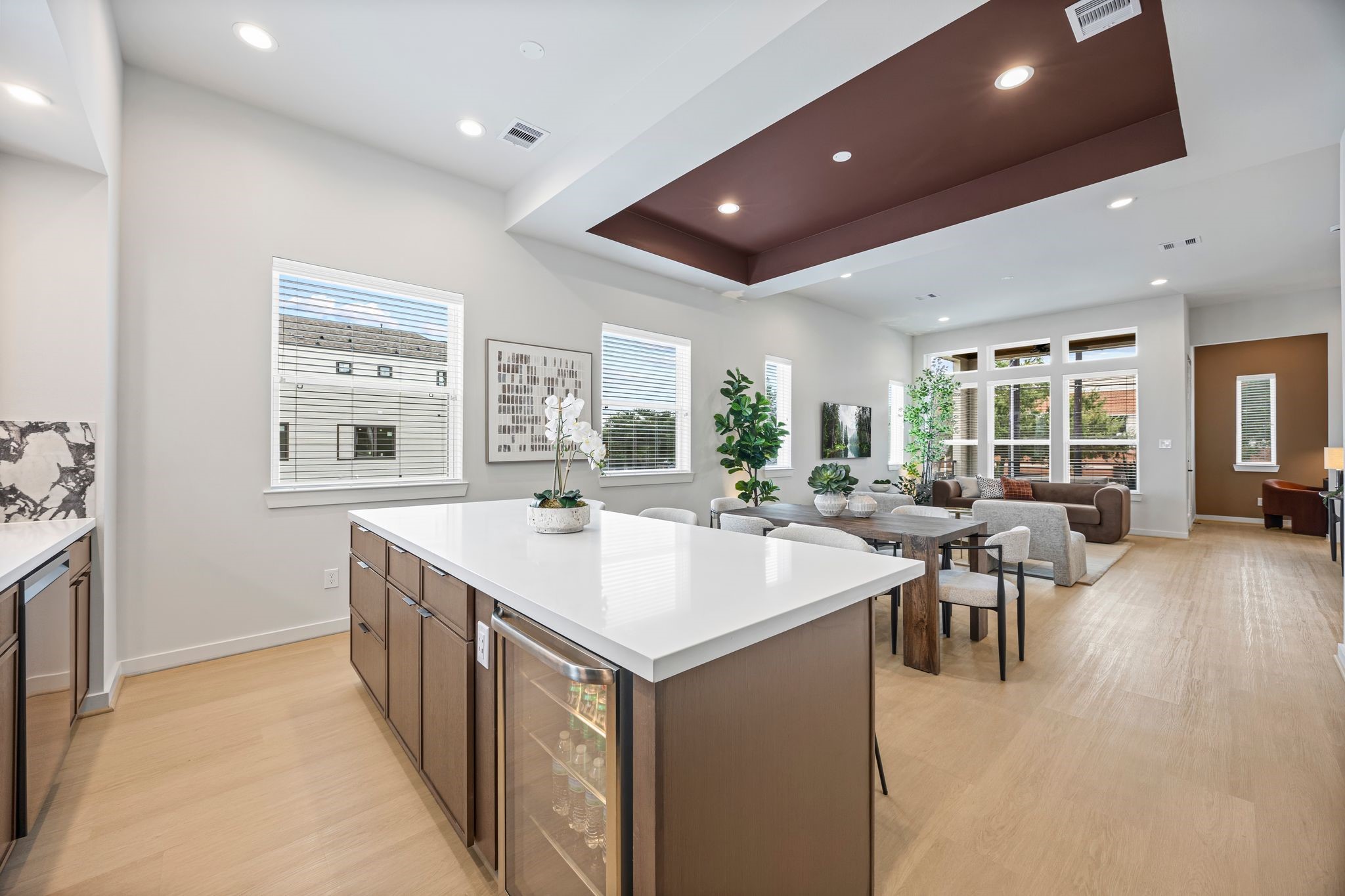 Experience seamless living with this open-concept kitchen, dining, and living area, featuring sleek finishes and abundant natural light for a perfect blend of style and functionality. **Model Home of similar layout & finishes.** Experience seamless living with this open-concept kitchen, dining, and living area, featuring sleek finishes and abundant natural light for a perfect blend of style and functionality. **Model Home of similar layout & finishes.**