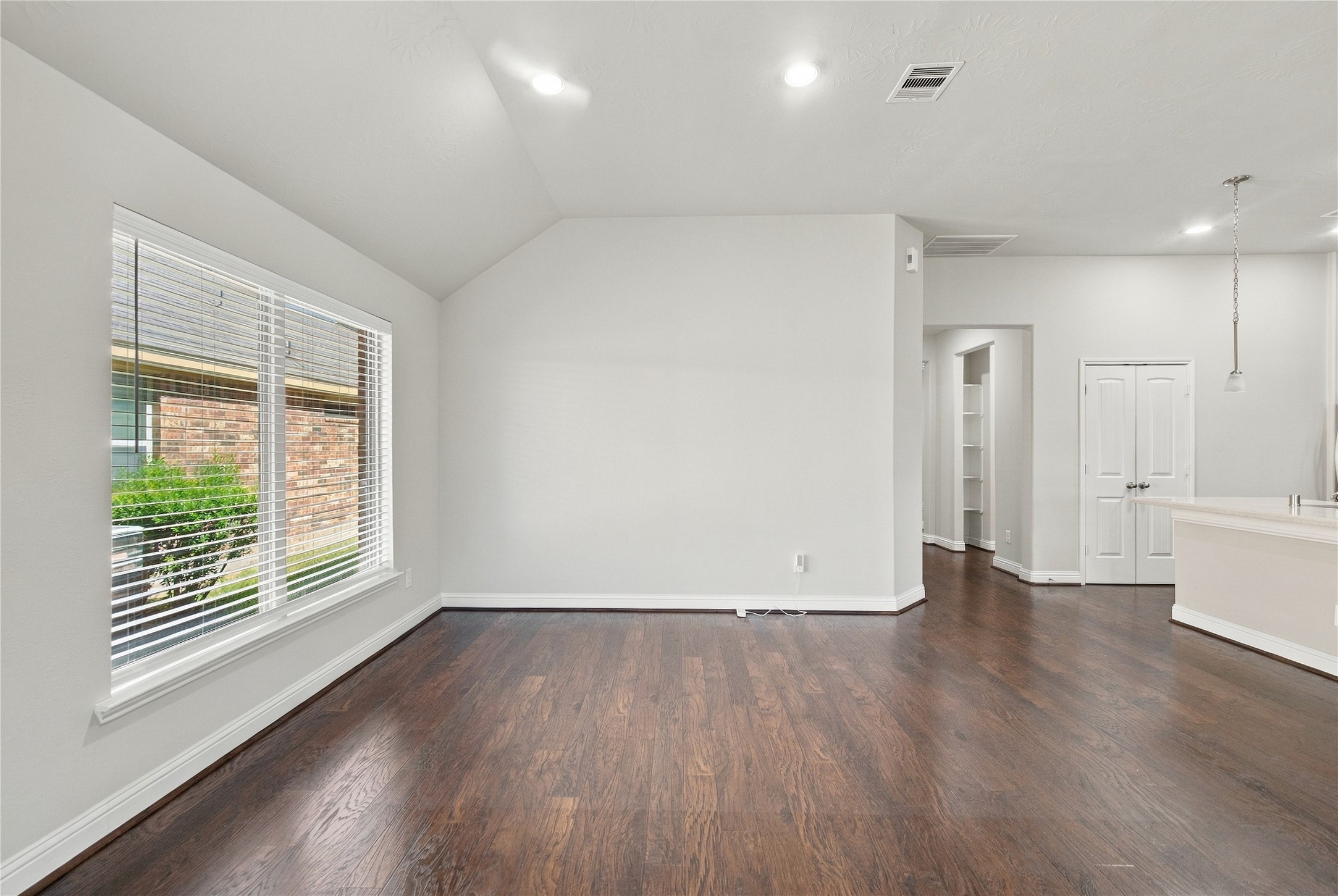 The breakfast room opens to the kitchen and family room.
