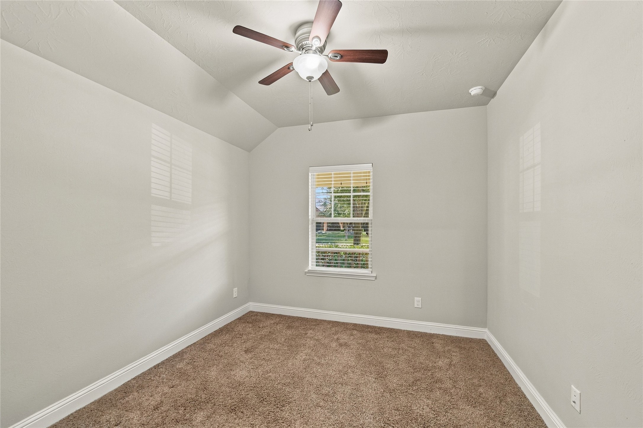 One of two secondary bedrooms.