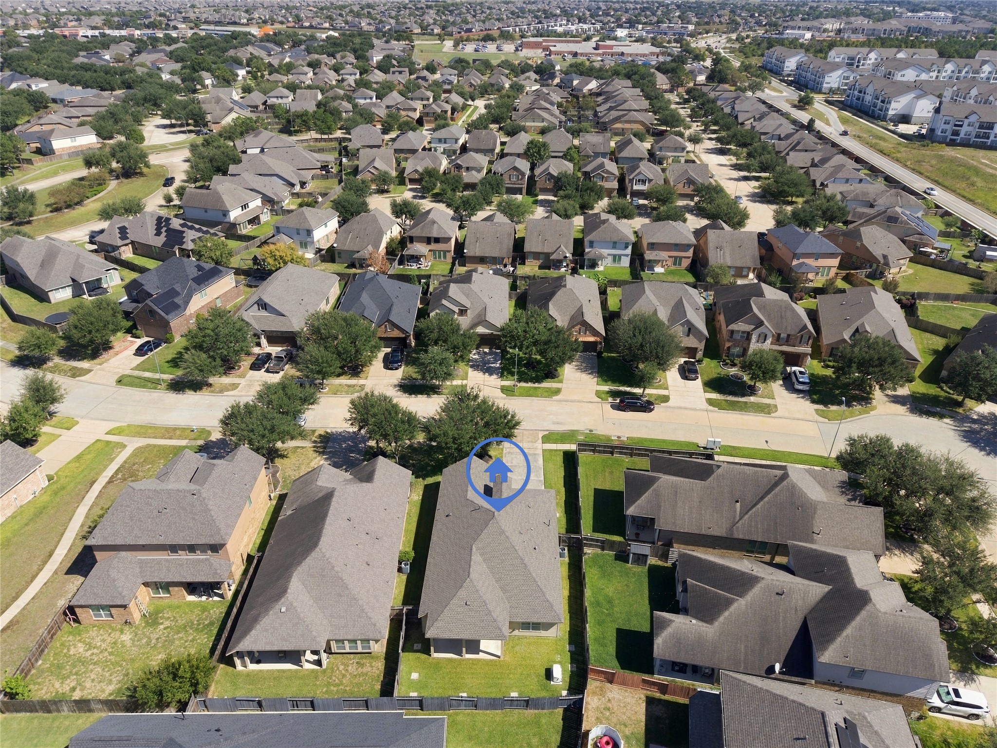 The aerial view provides a look into the backyard.