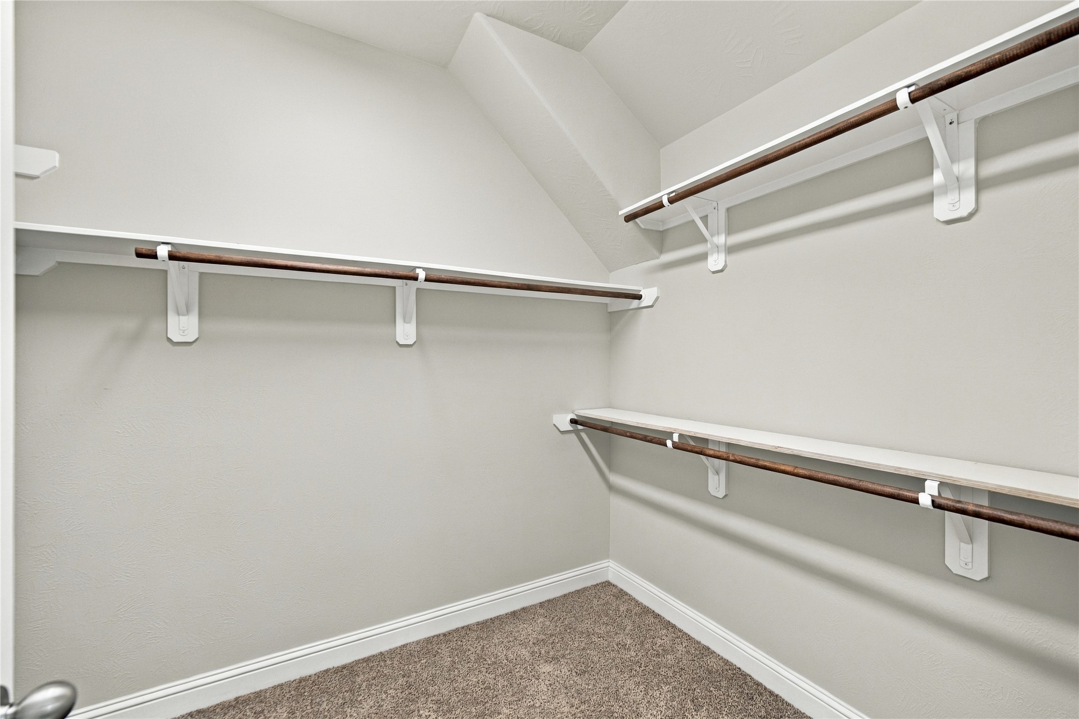 The primary ensuite walk-in closet.