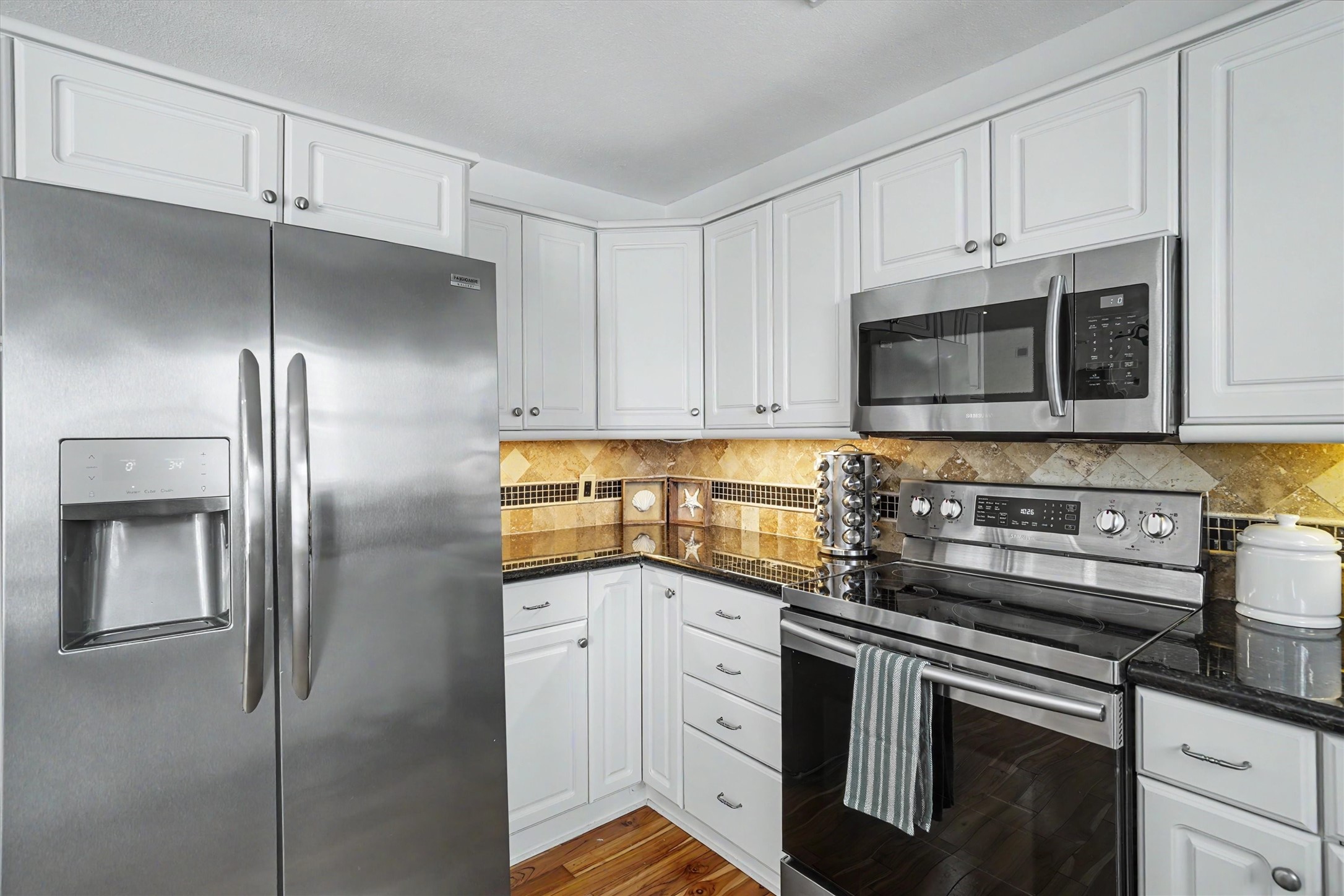 Kitchen refrigerator stays with the home