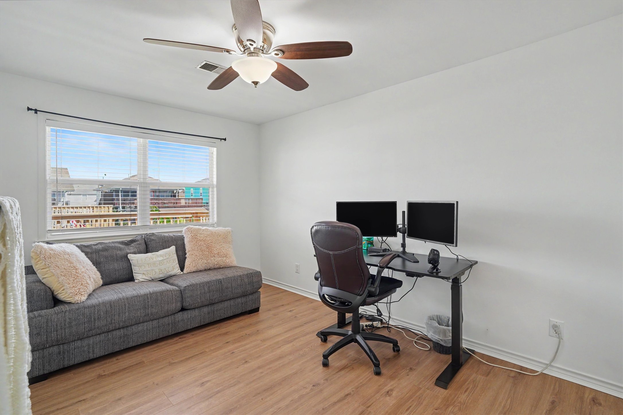 Waterside bedroom with water views is currently being used as an office
