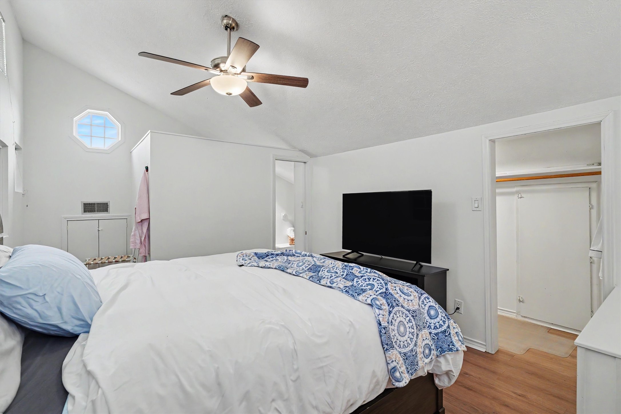 The primary bedroom was created upstairs with an added walk in closet and an ensuite. This is a large primary bedroom