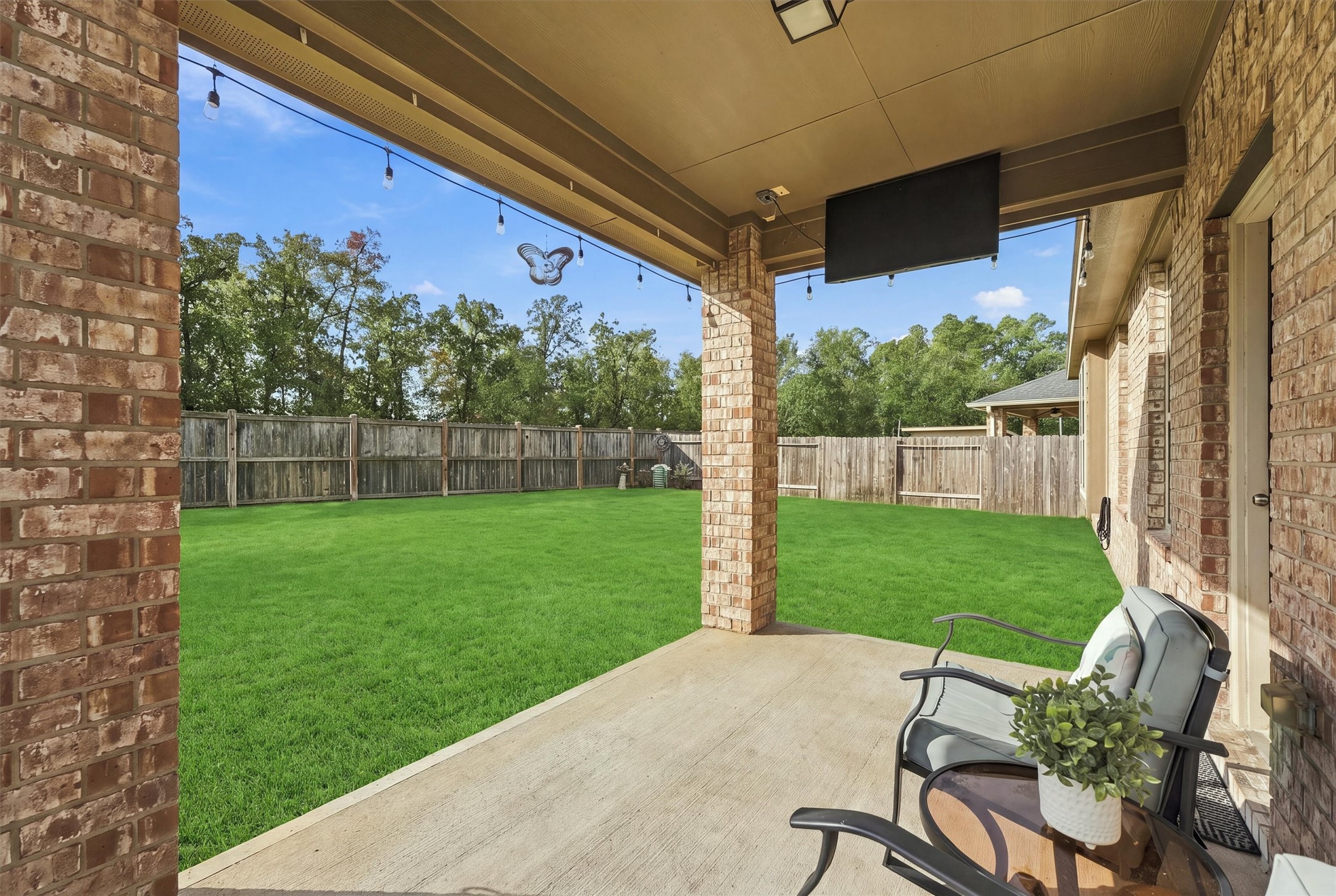 Enjoy morning sun and backyard views from the southeast-facing covered patio.