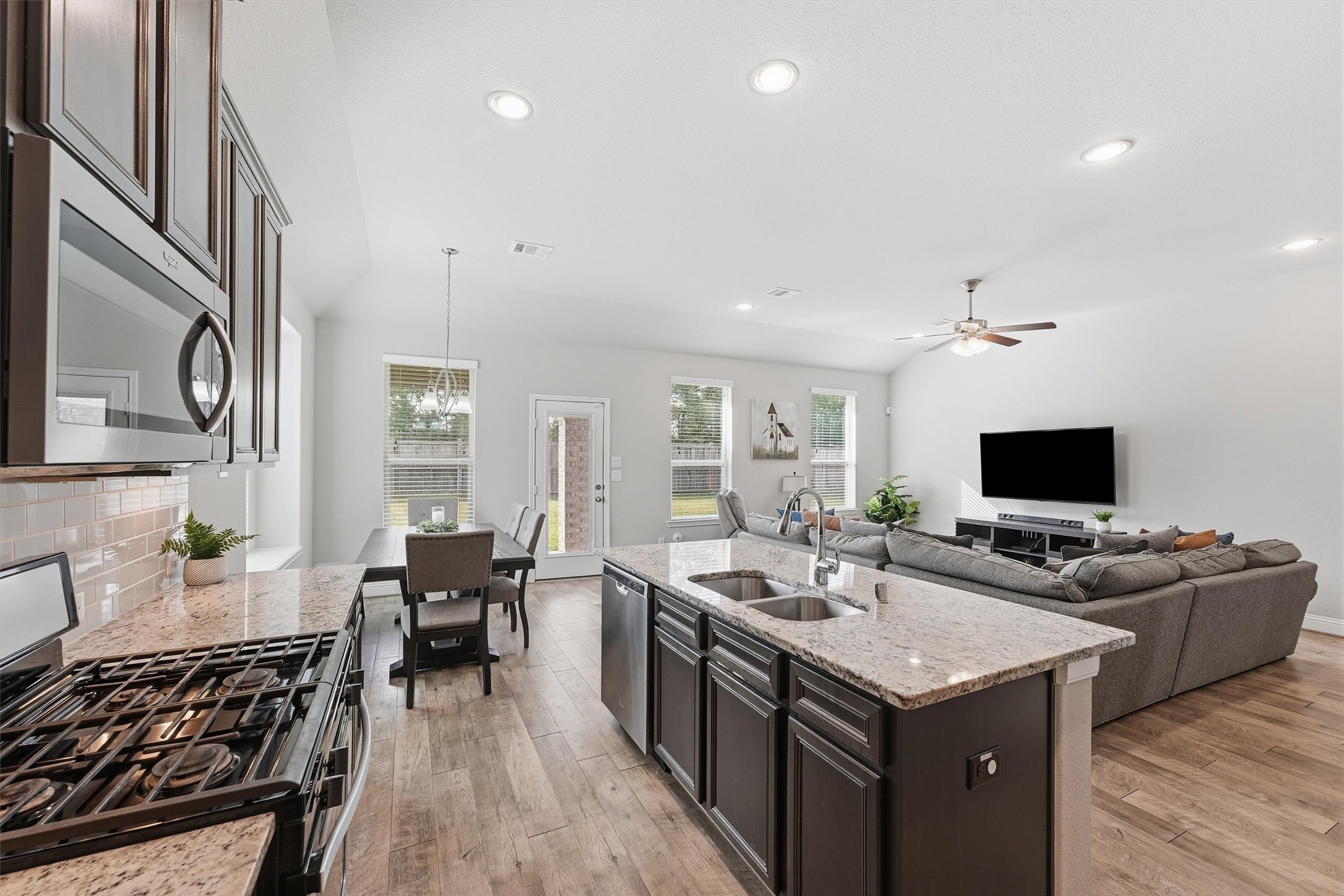 True open-concept living connects the kitchen, dining and family roomideal for entertaining. True open-concept living connects the kitchen, dining and family roomideal for entertaining.